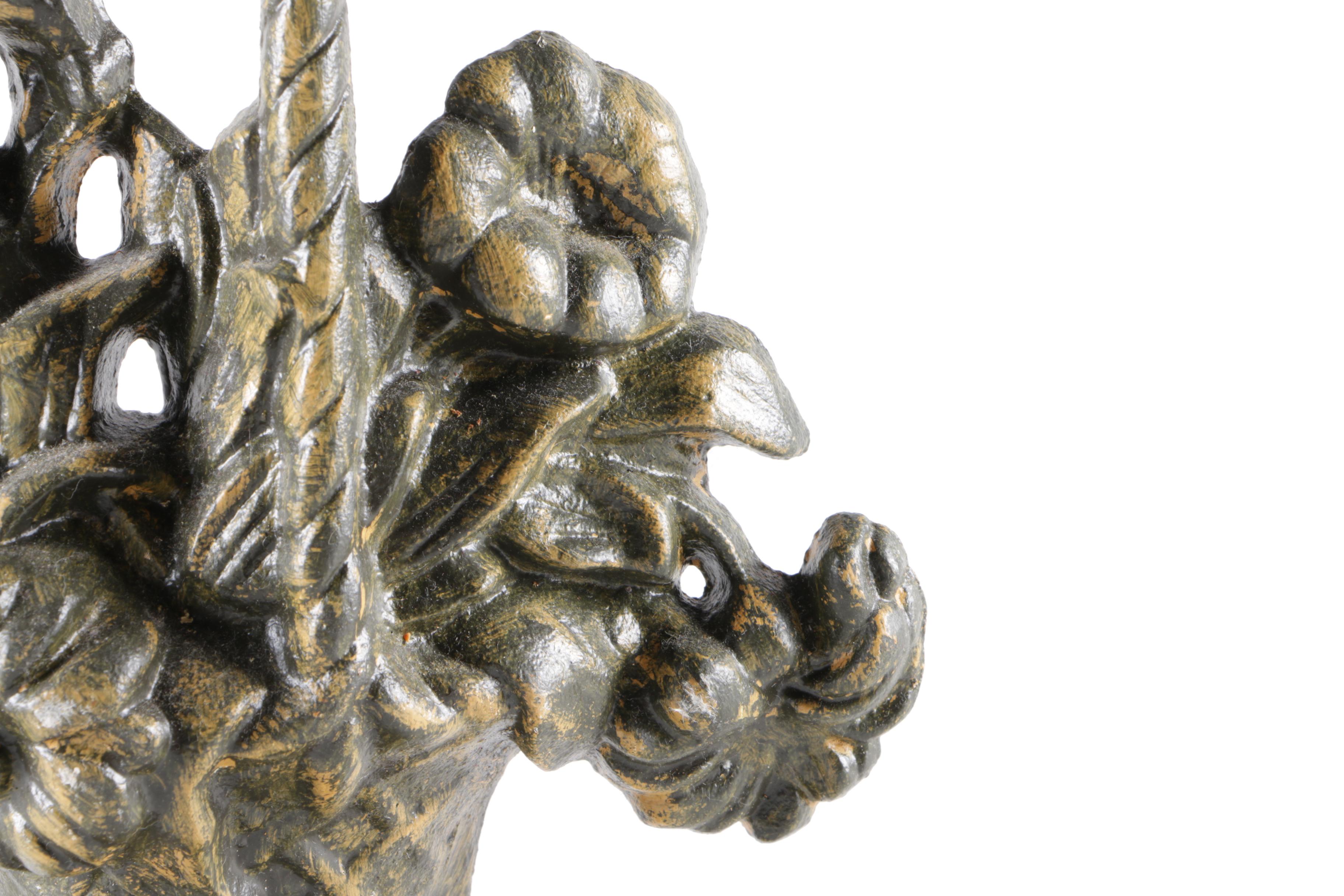 Cast Iron Floral Door Stopper with a Brass Patina