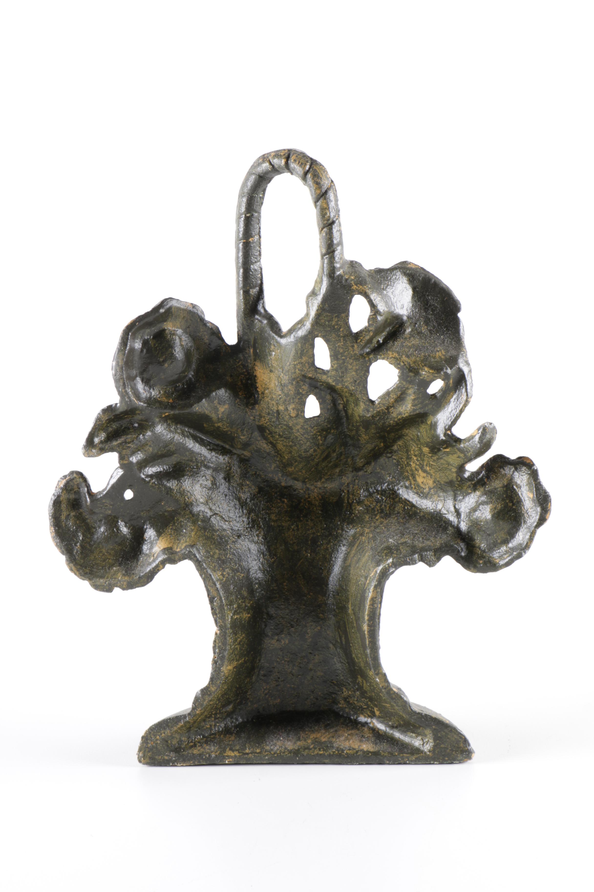 Cast Iron Floral Door Stopper with a Brass Patina