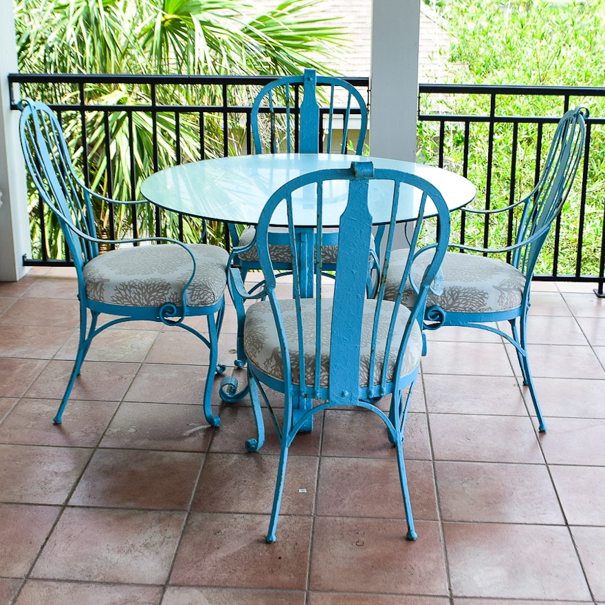 Cast Iron and Glass Round Patio Table and Four Chairs