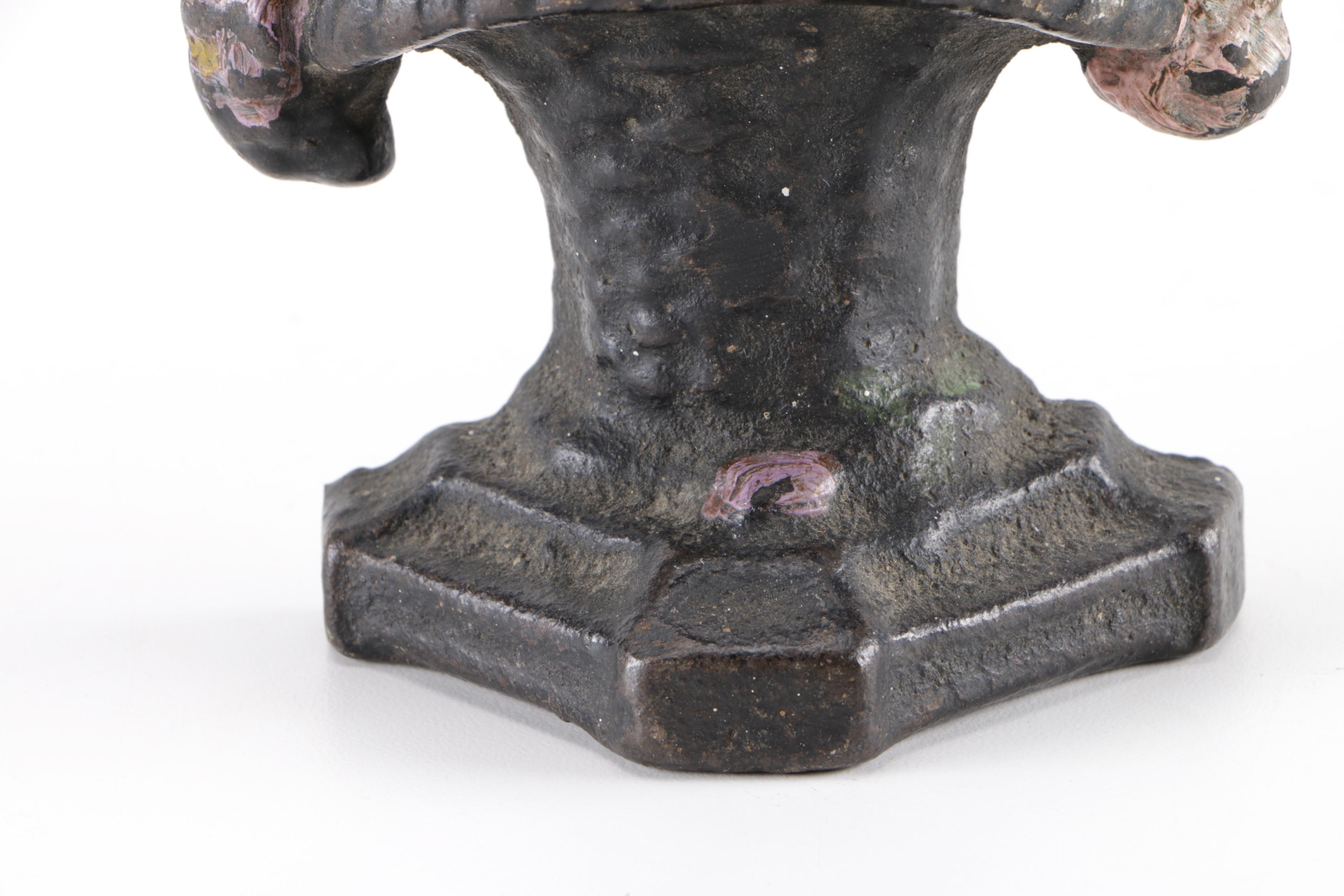 Pair of Cast Iron Floral Arrangement Door Stoppers