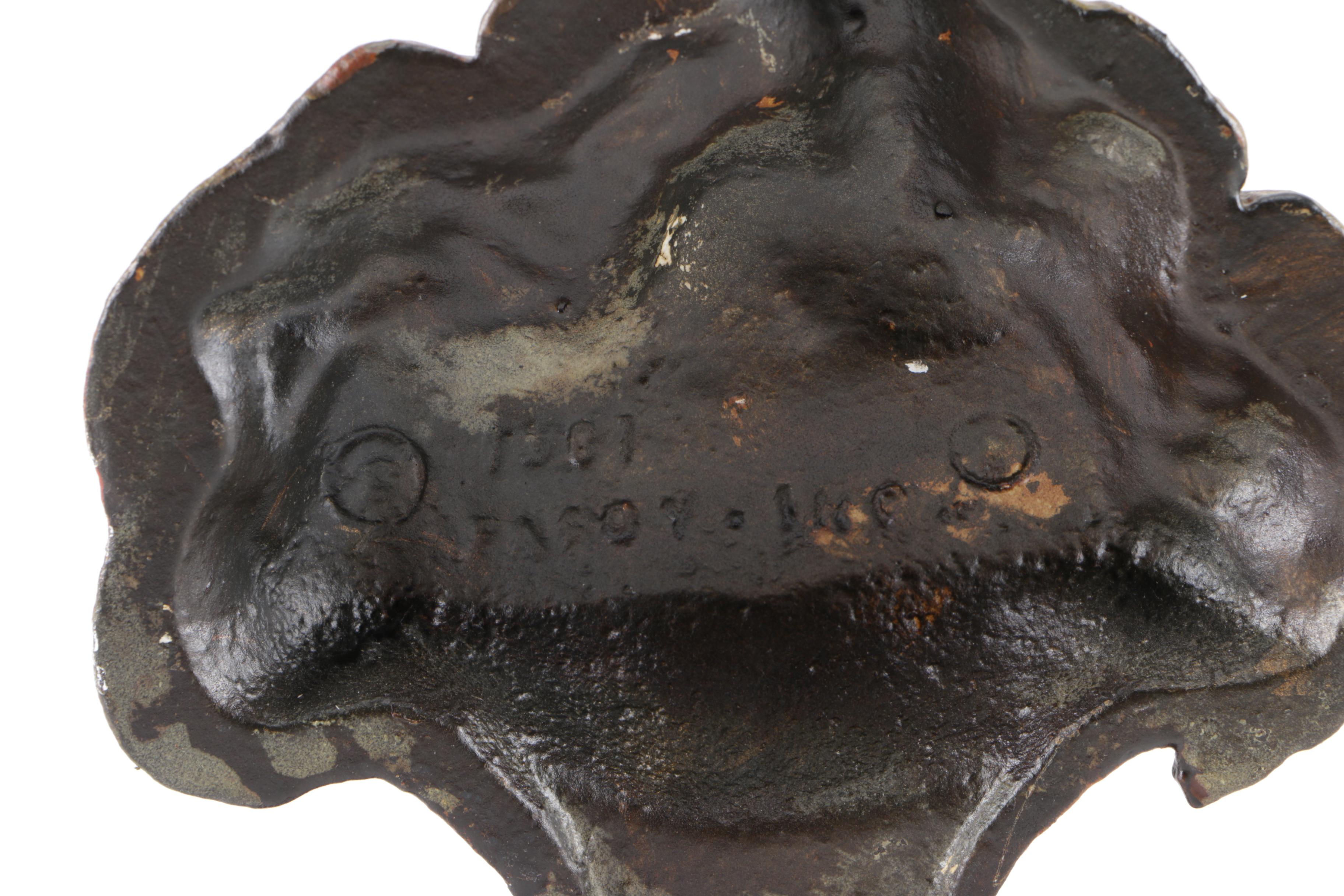 Pair of Cast Iron Floral Arrangement Door Stoppers