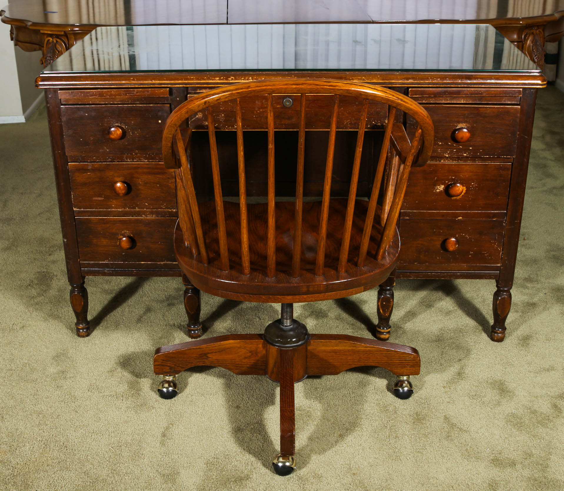Desk and Chair With a Mahogany Finish