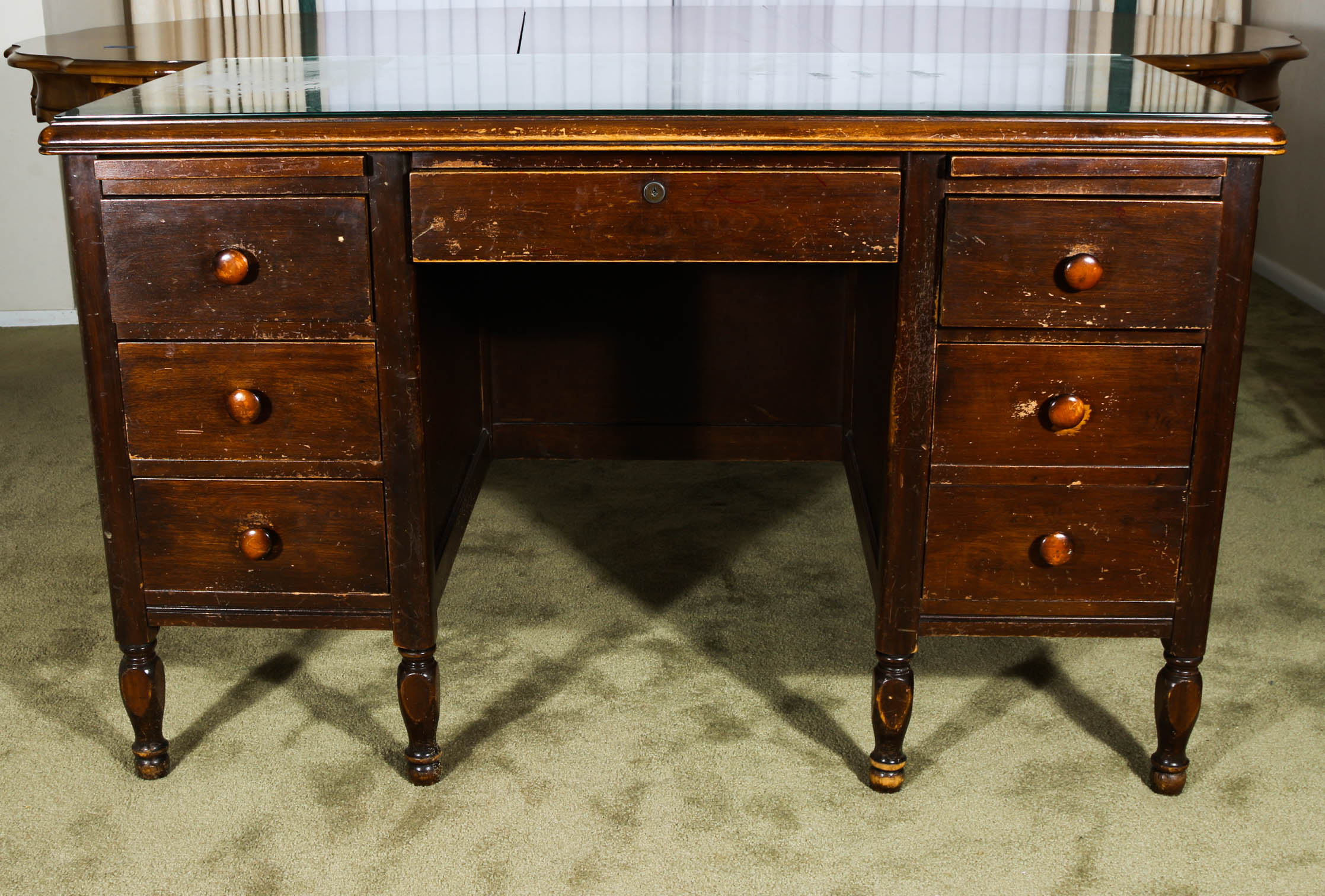 Desk and Chair With a Mahogany Finish
