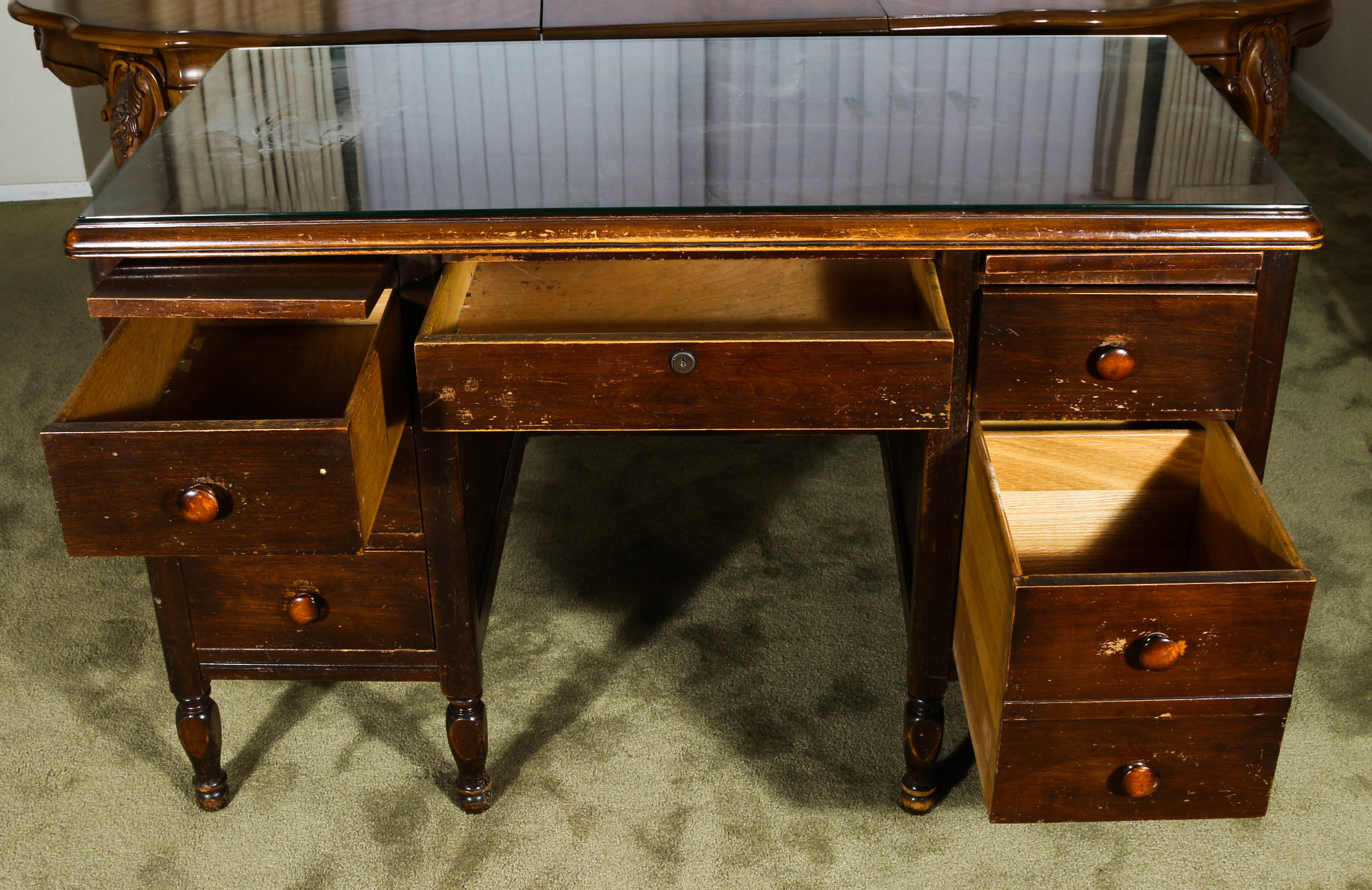 Desk and Chair With a Mahogany Finish