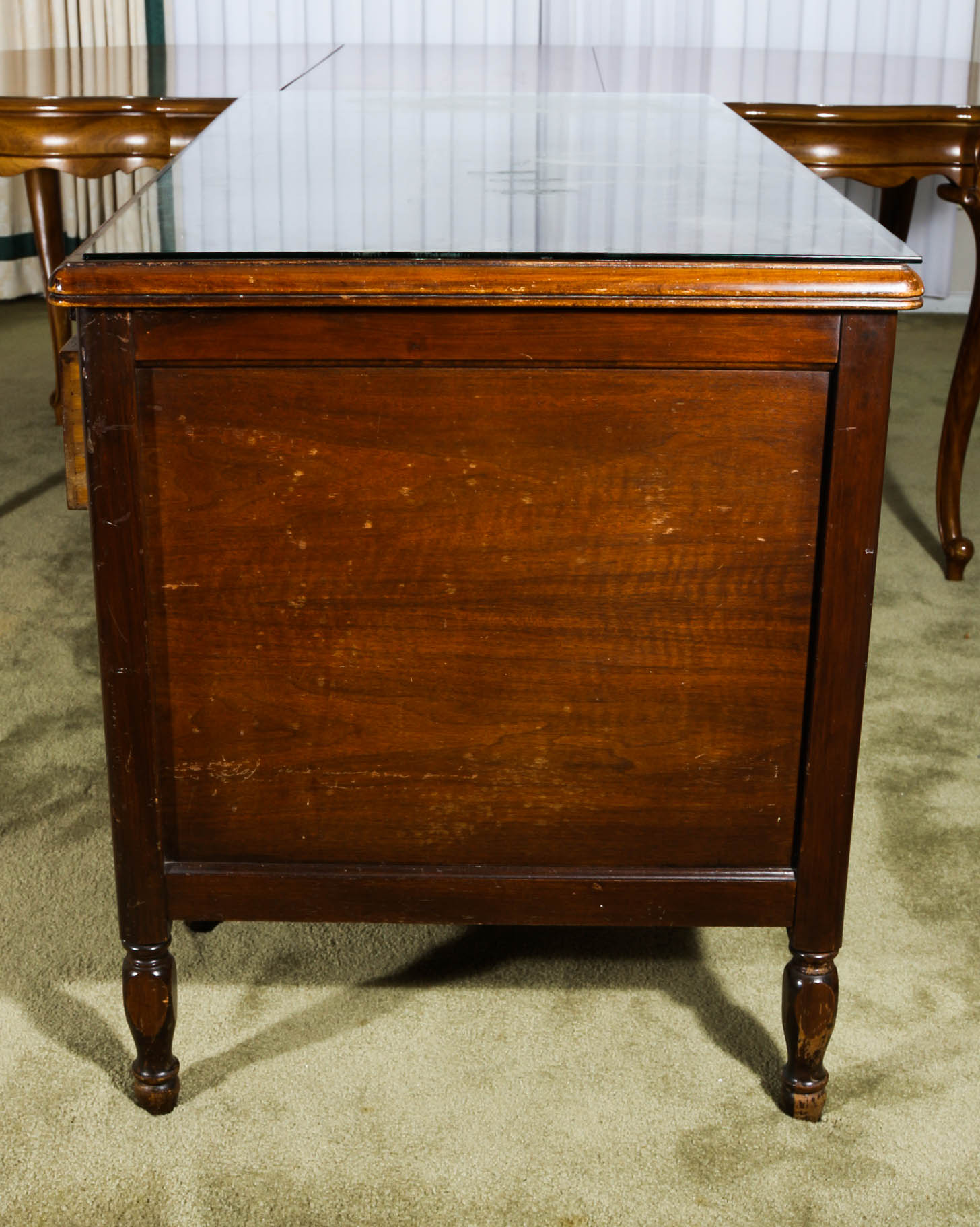 Desk and Chair With a Mahogany Finish