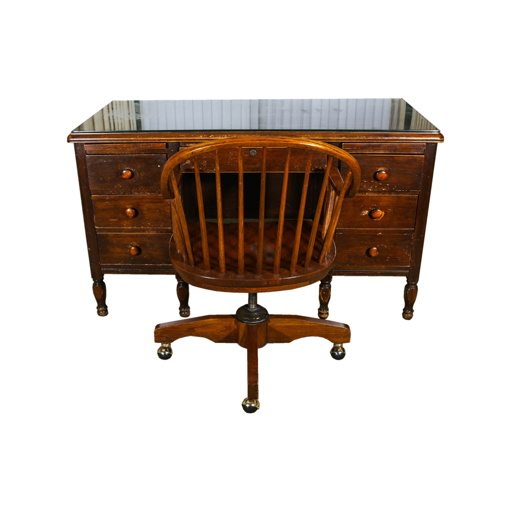 Desk and Chair With a Mahogany Finish