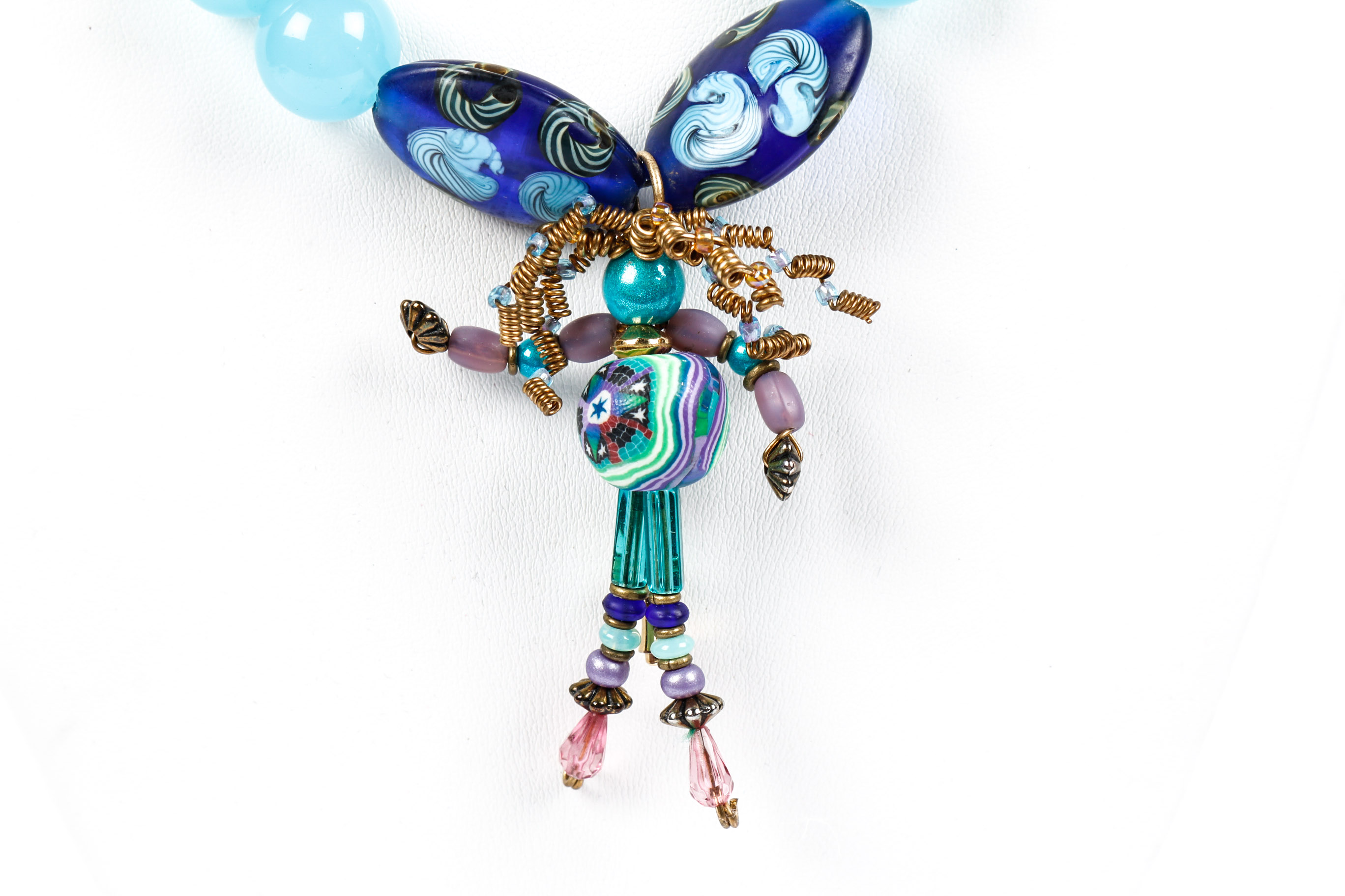 Aque Blue Beaded Necklace With Modern Bead Figurine Pendant