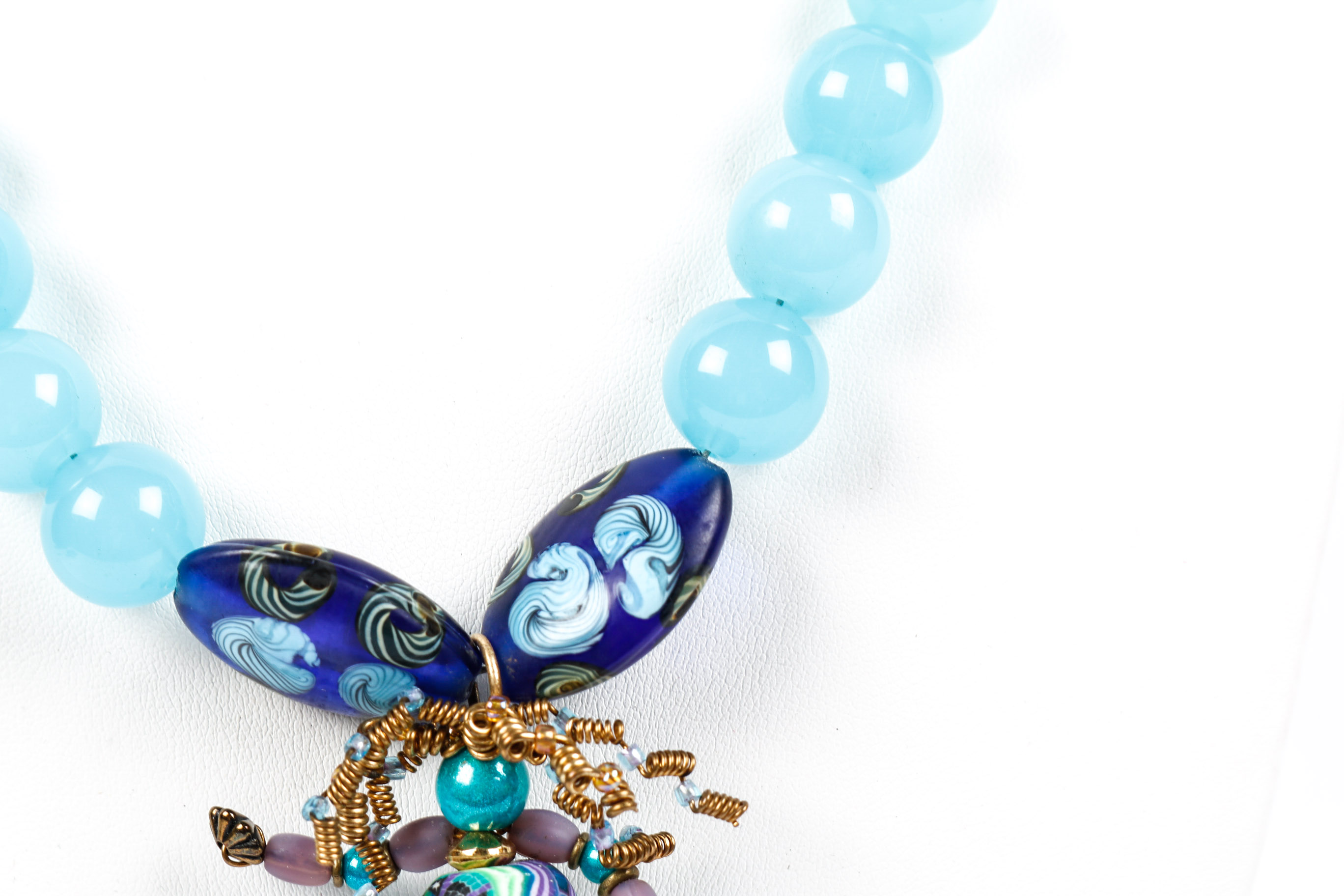 Aque Blue Beaded Necklace With Modern Bead Figurine Pendant