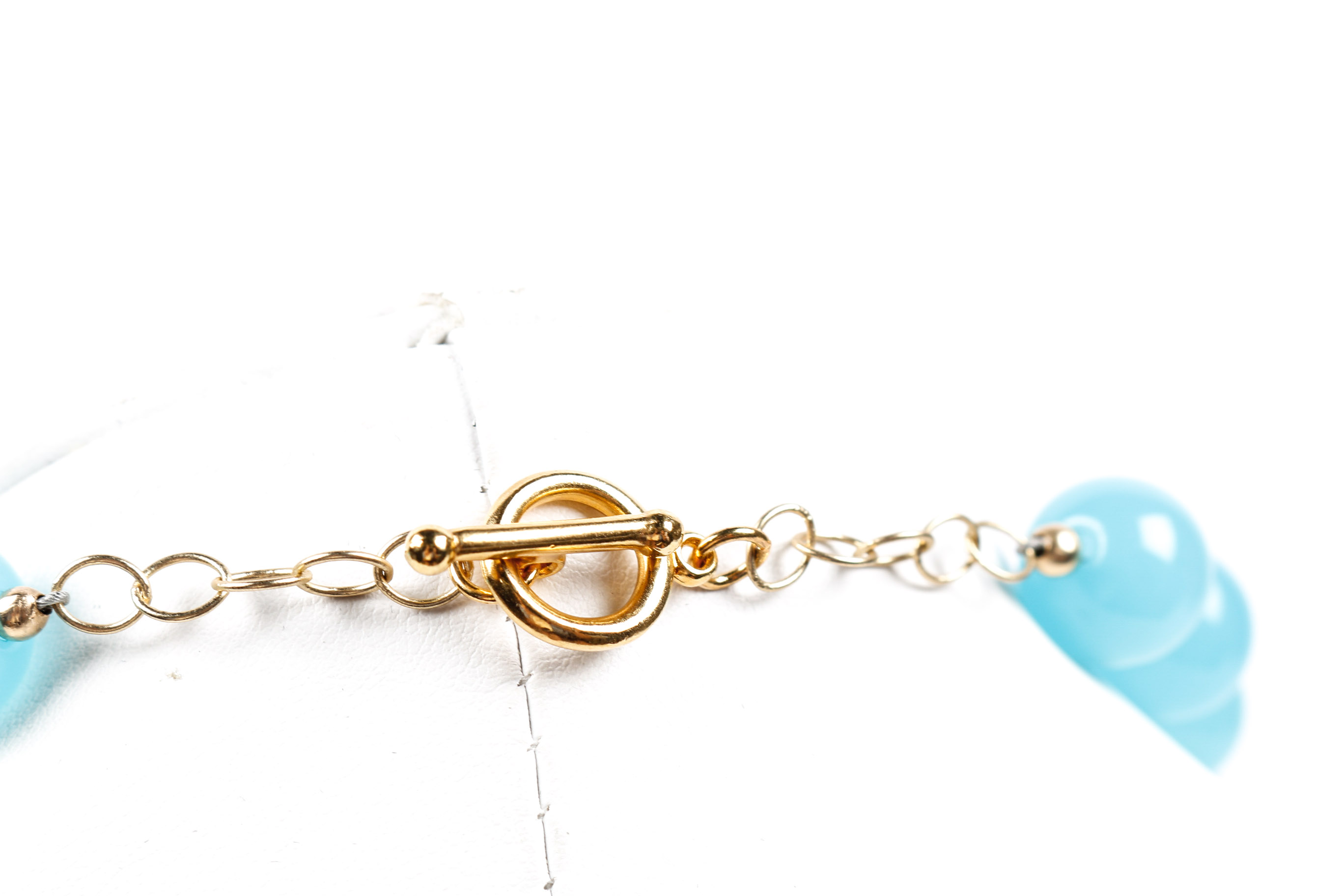 Aque Blue Beaded Necklace With Modern Bead Figurine Pendant