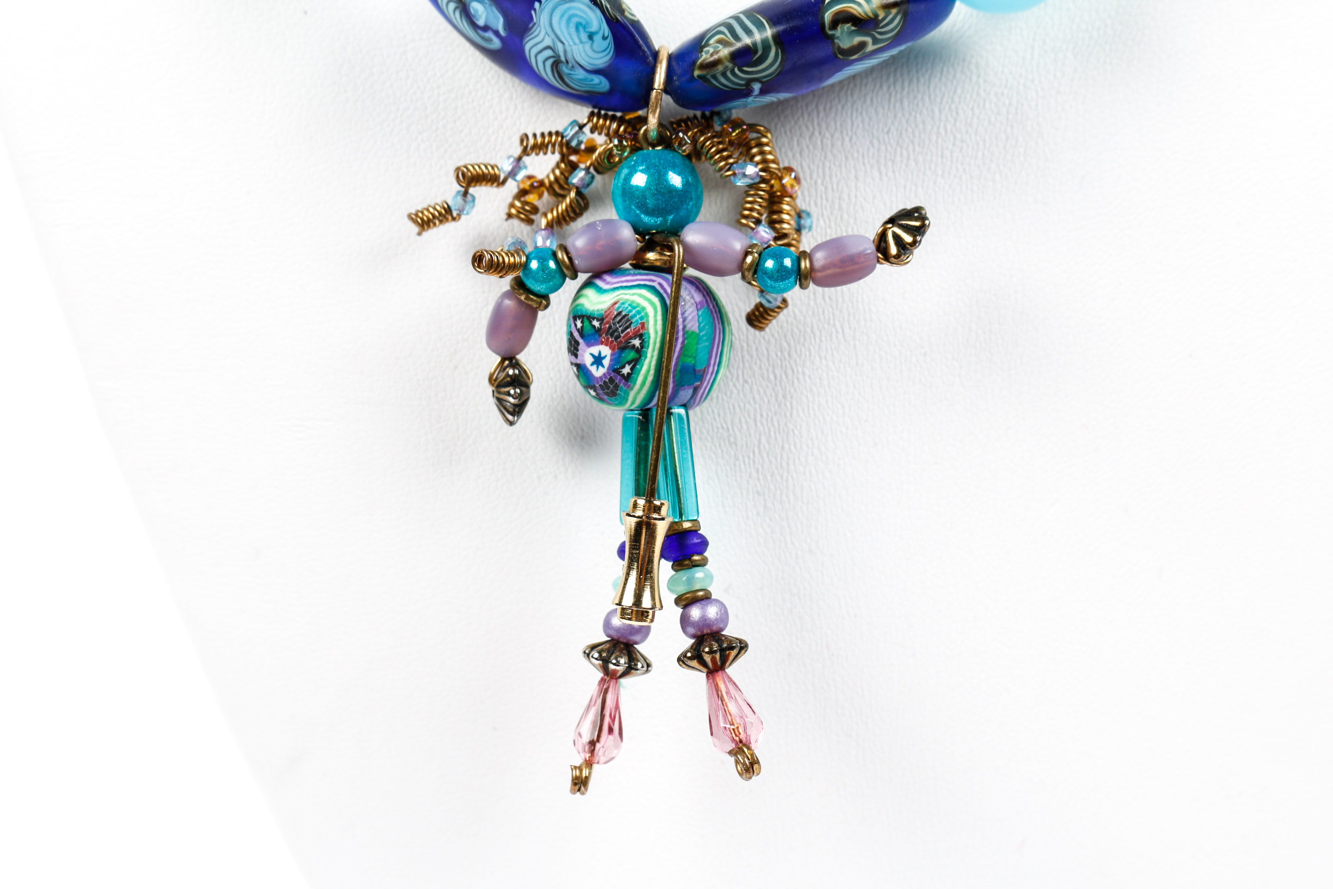 Aque Blue Beaded Necklace With Modern Bead Figurine Pendant