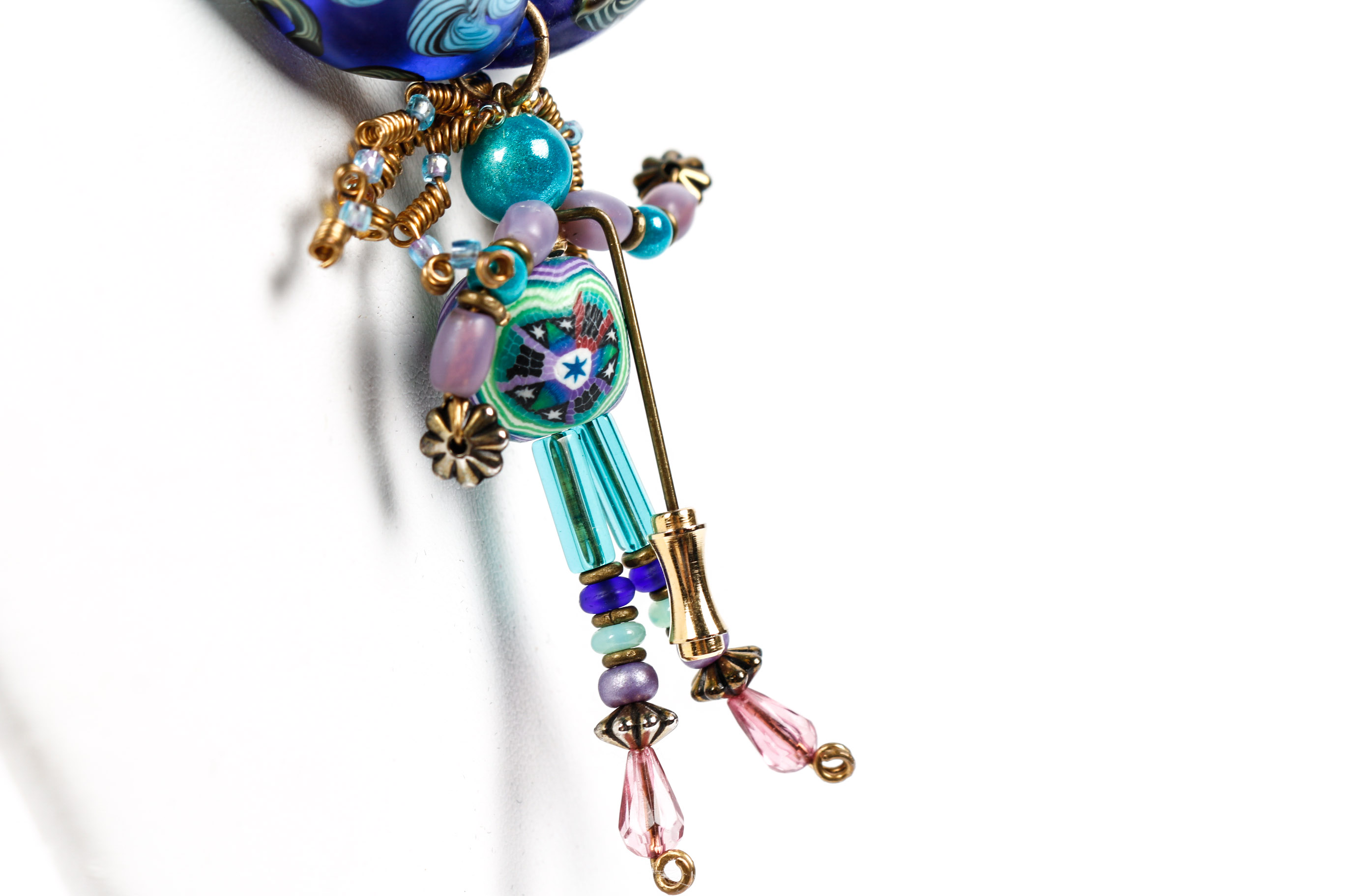 Aque Blue Beaded Necklace With Modern Bead Figurine Pendant