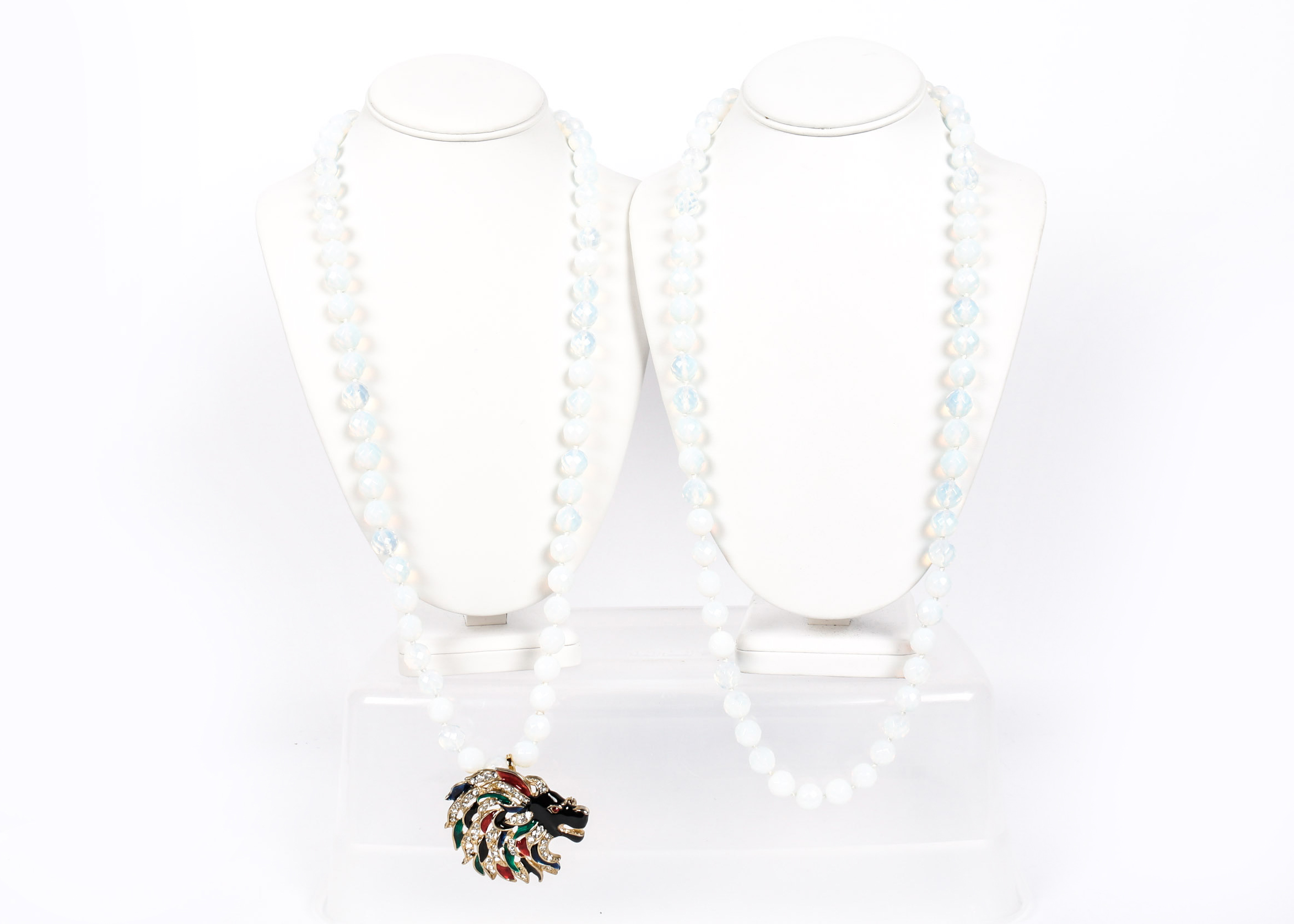 Pair of Necklaces With Lion Head Brooch