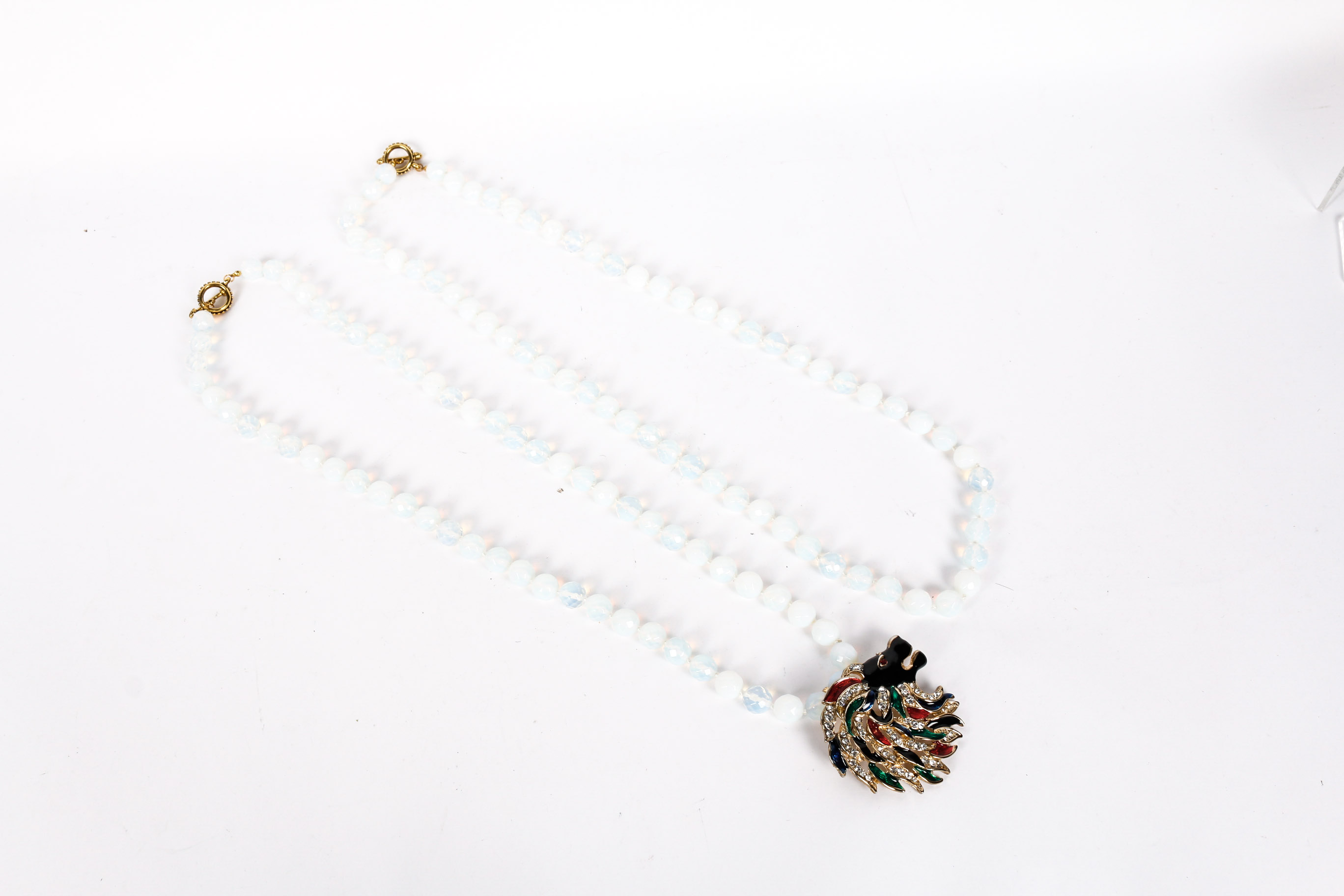 Pair of Necklaces With Lion Head Brooch