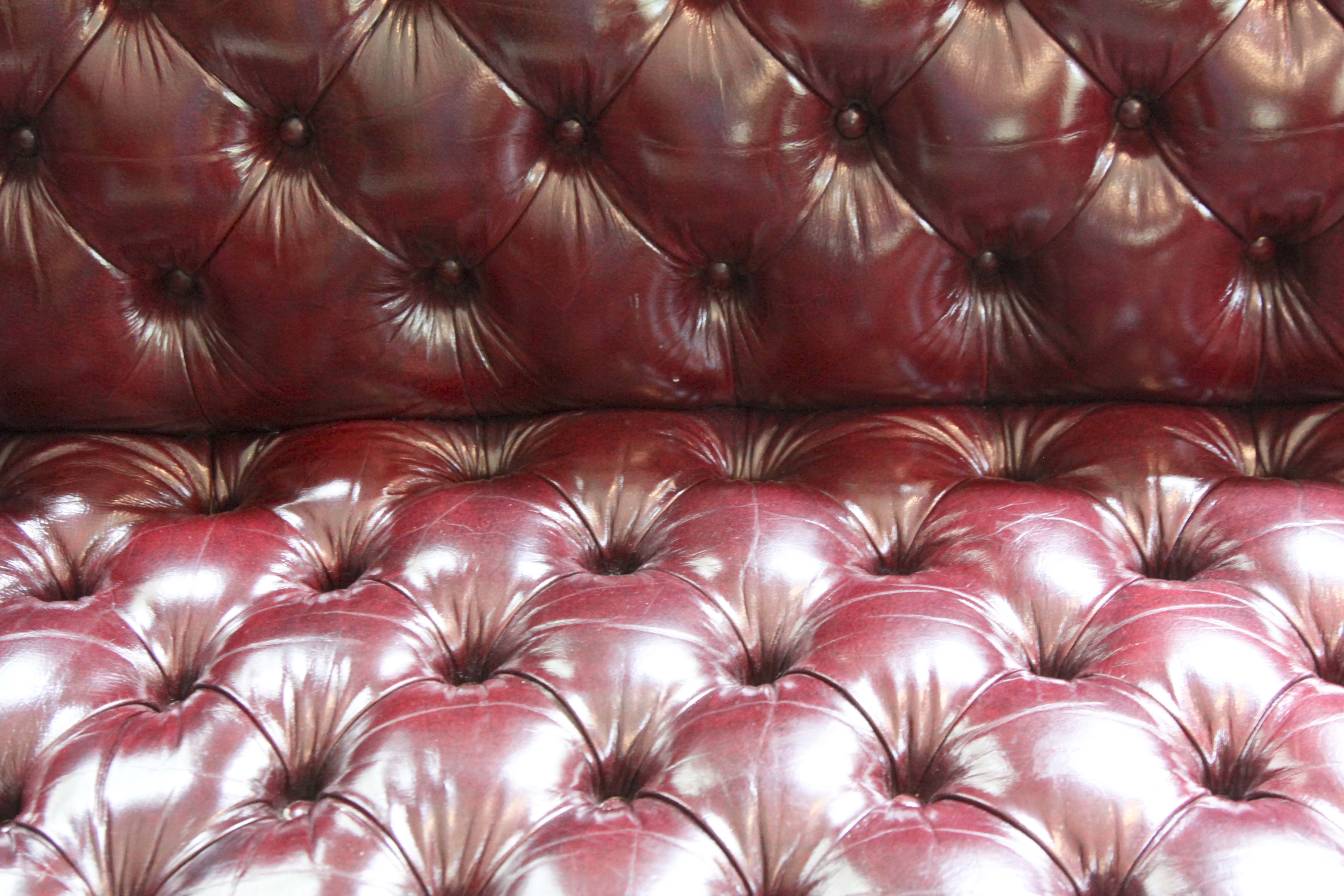 Burgundy Leather "Chesterfield" Style Sofa by Hancock & Moore