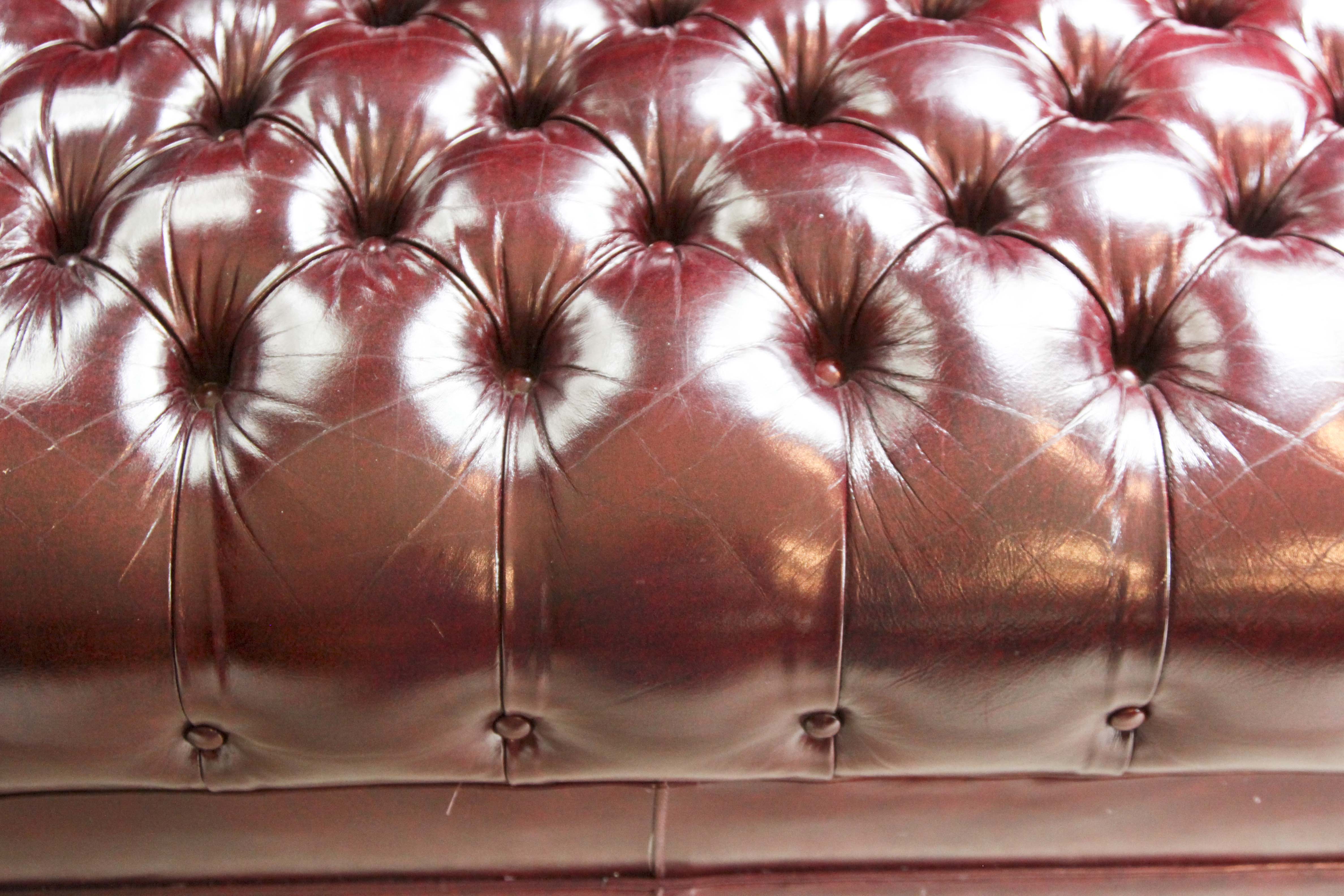 Burgundy Leather "Chesterfield" Style Sofa by Hancock & Moore