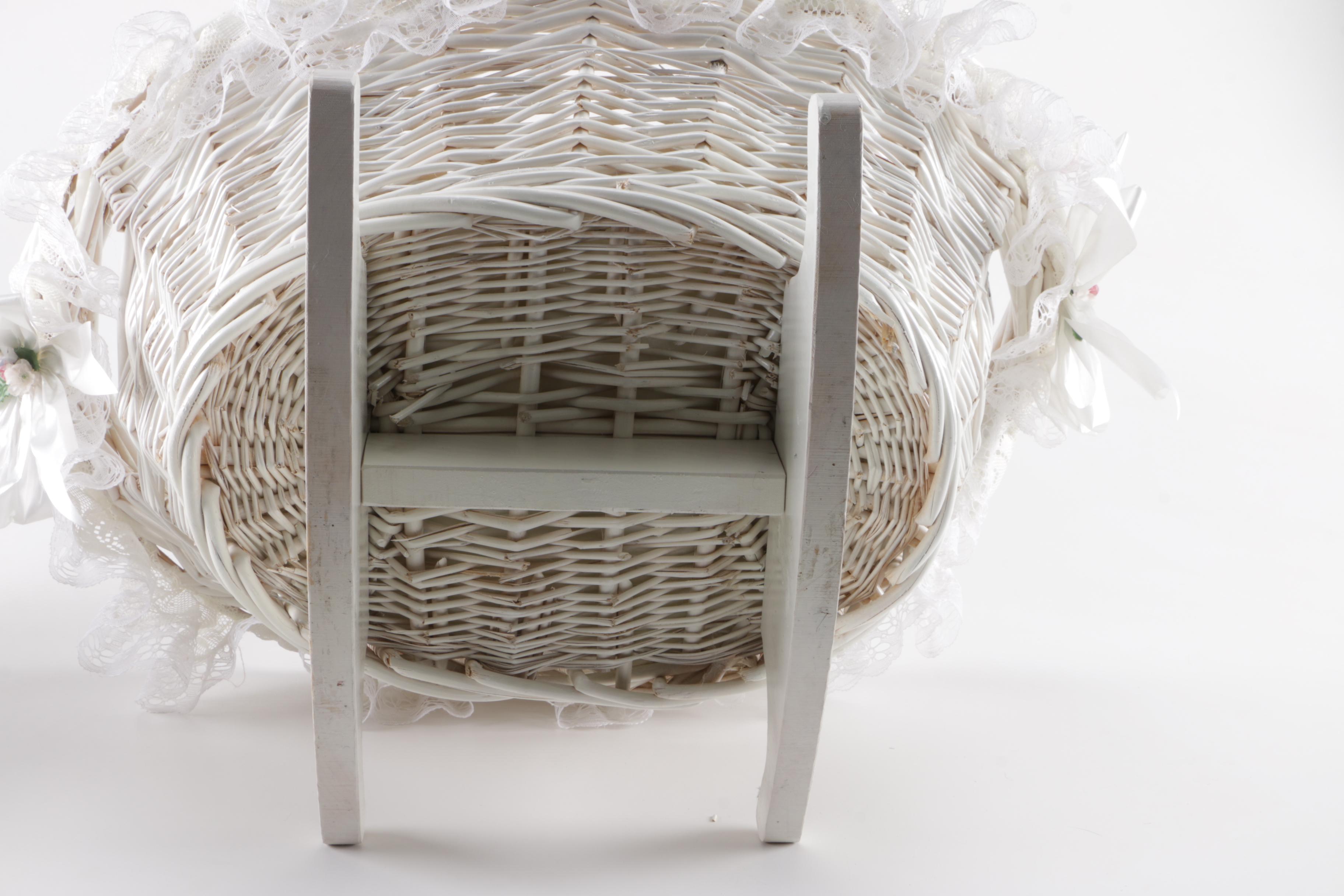 Porcelain Doll in Wicker Bassinet
