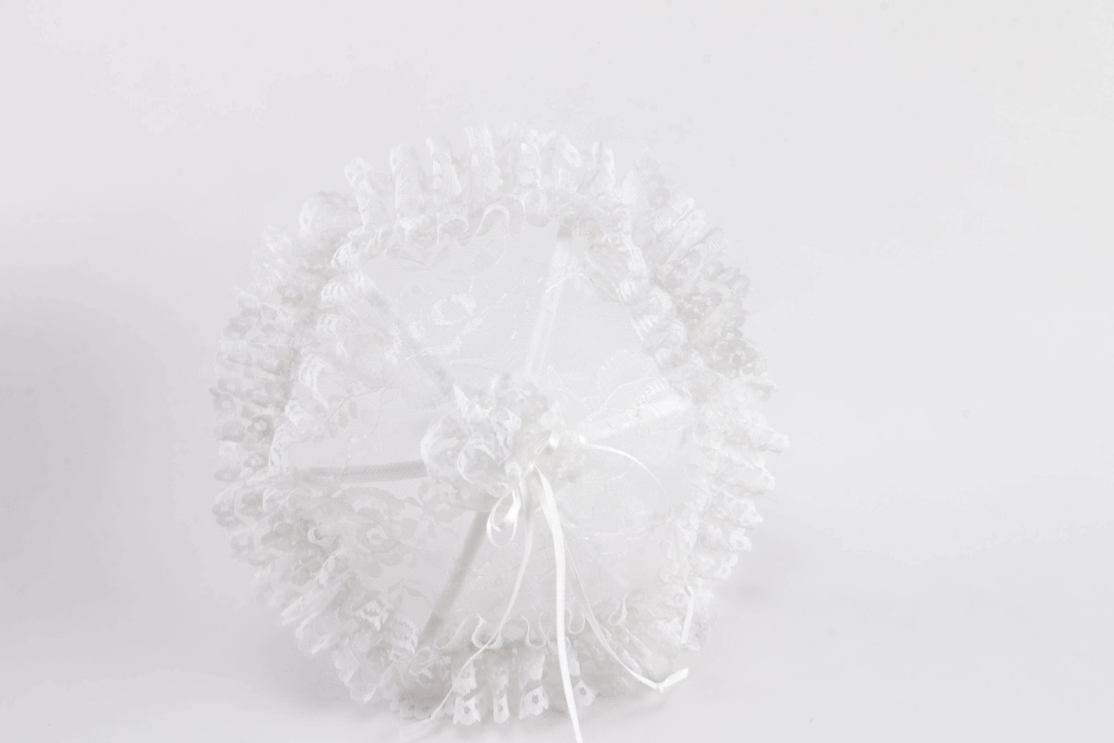 Porcelain Doll in Wicker Bassinet