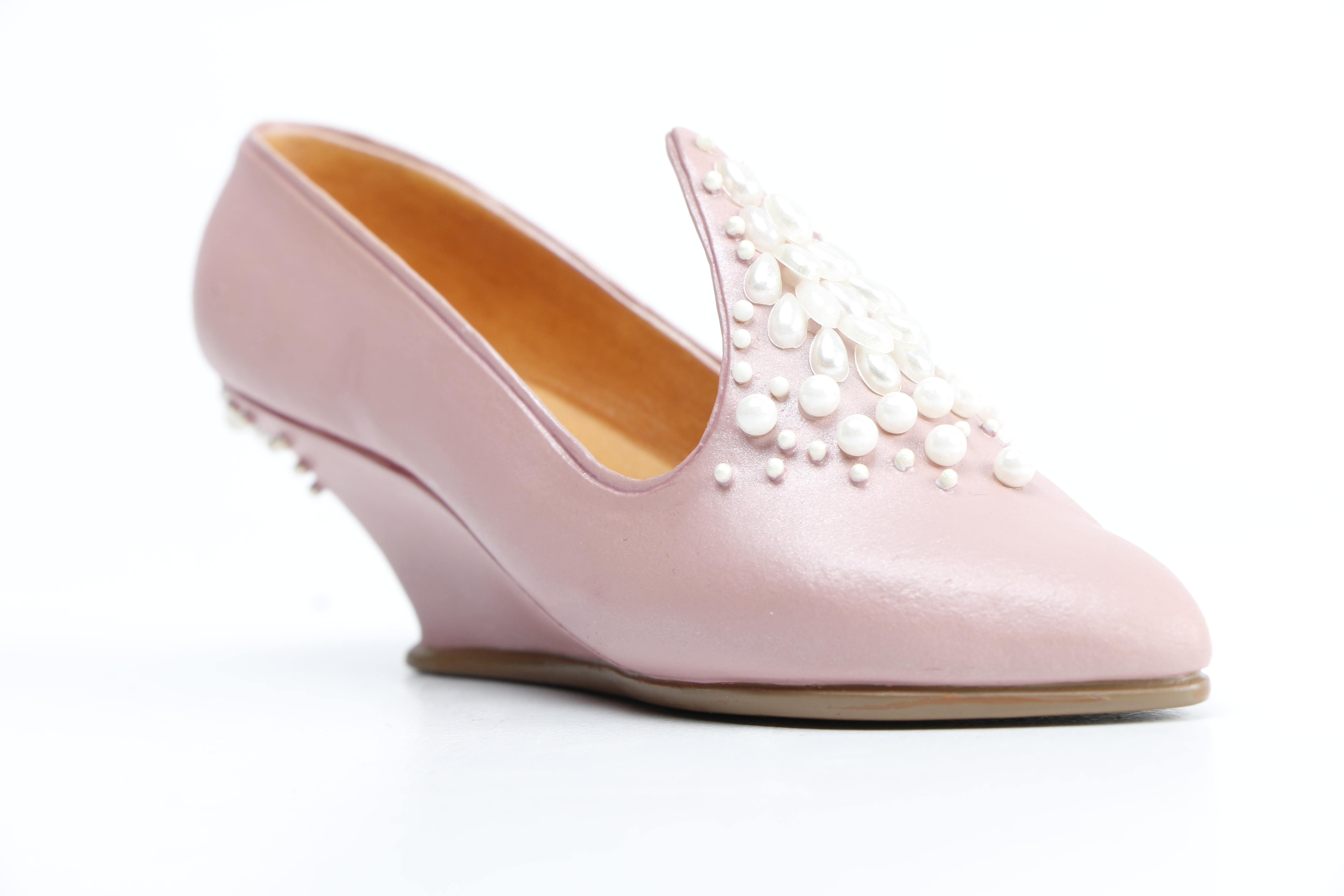 Miniature Heel Figurines Featuring Raine