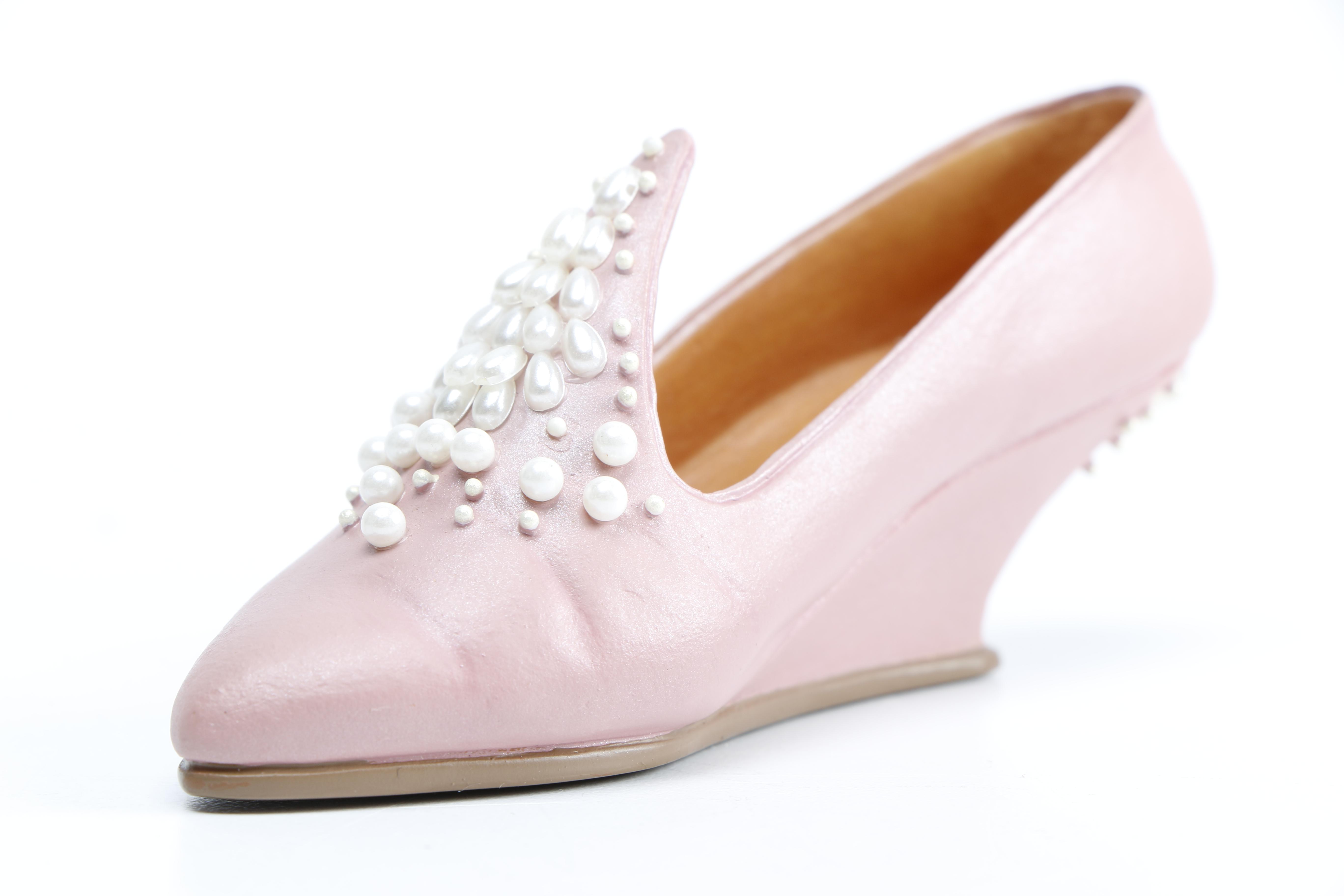 Miniature Heel Figurines Featuring Raine