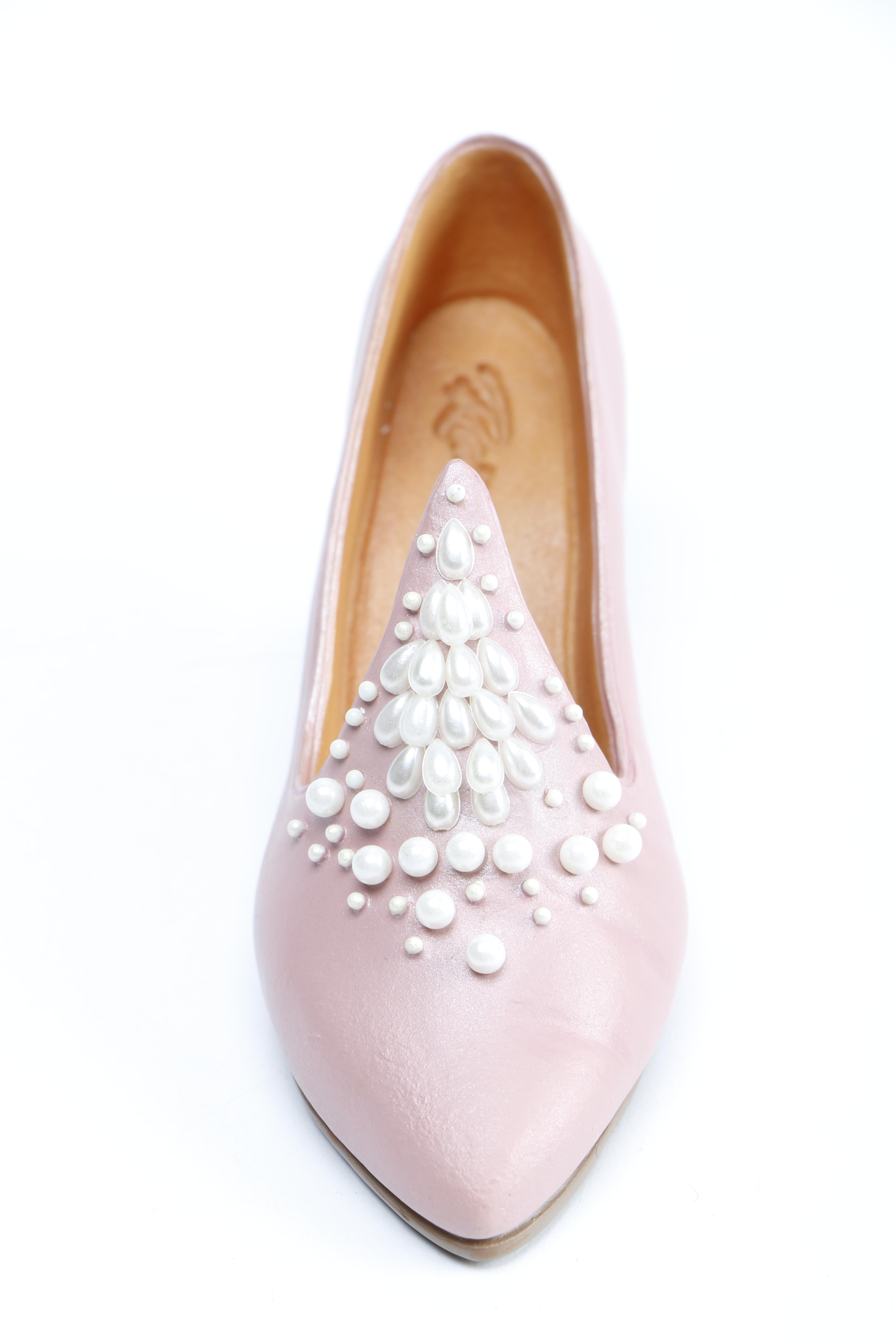 Miniature Heel Figurines Featuring Raine