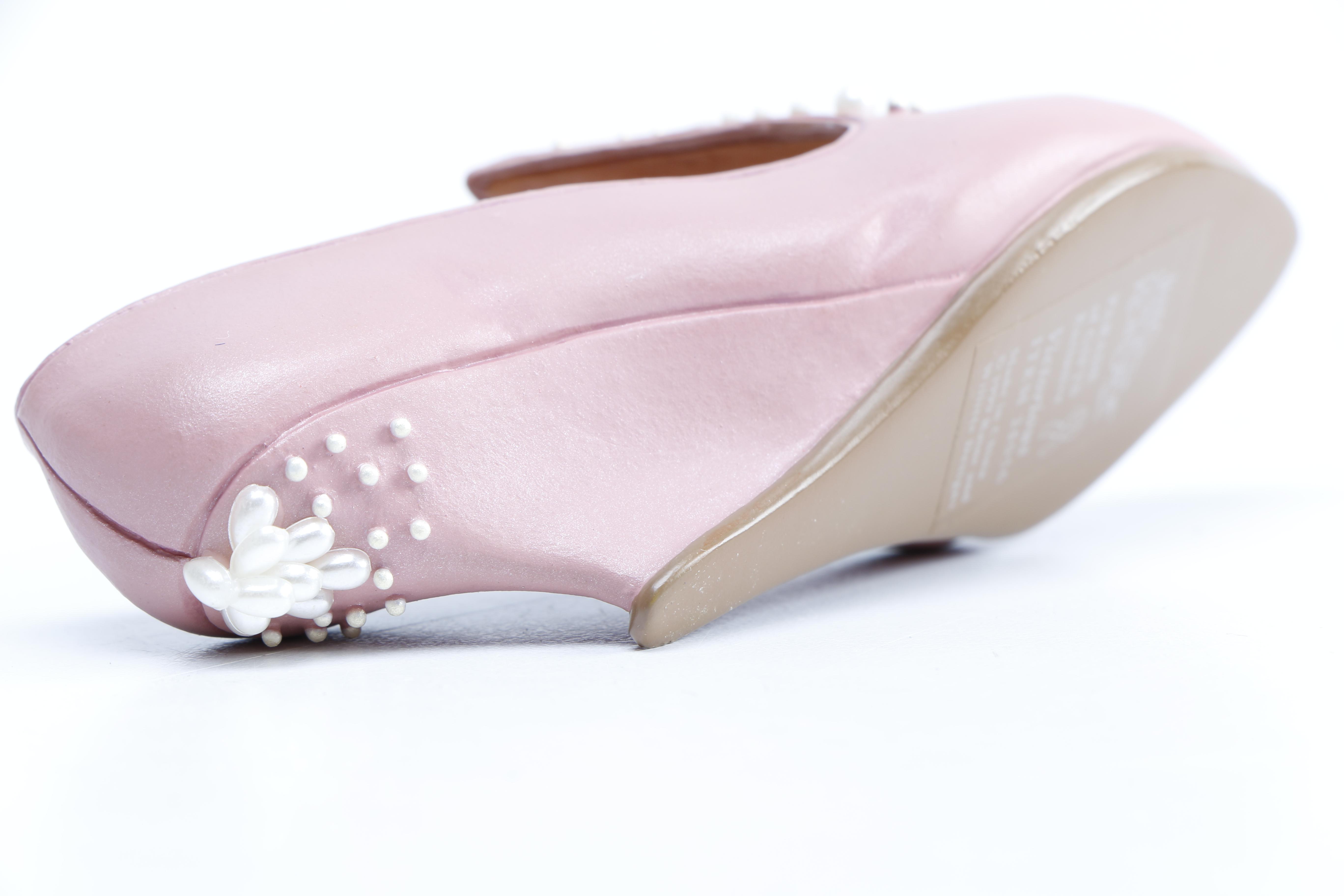 Miniature Heel Figurines Featuring Raine