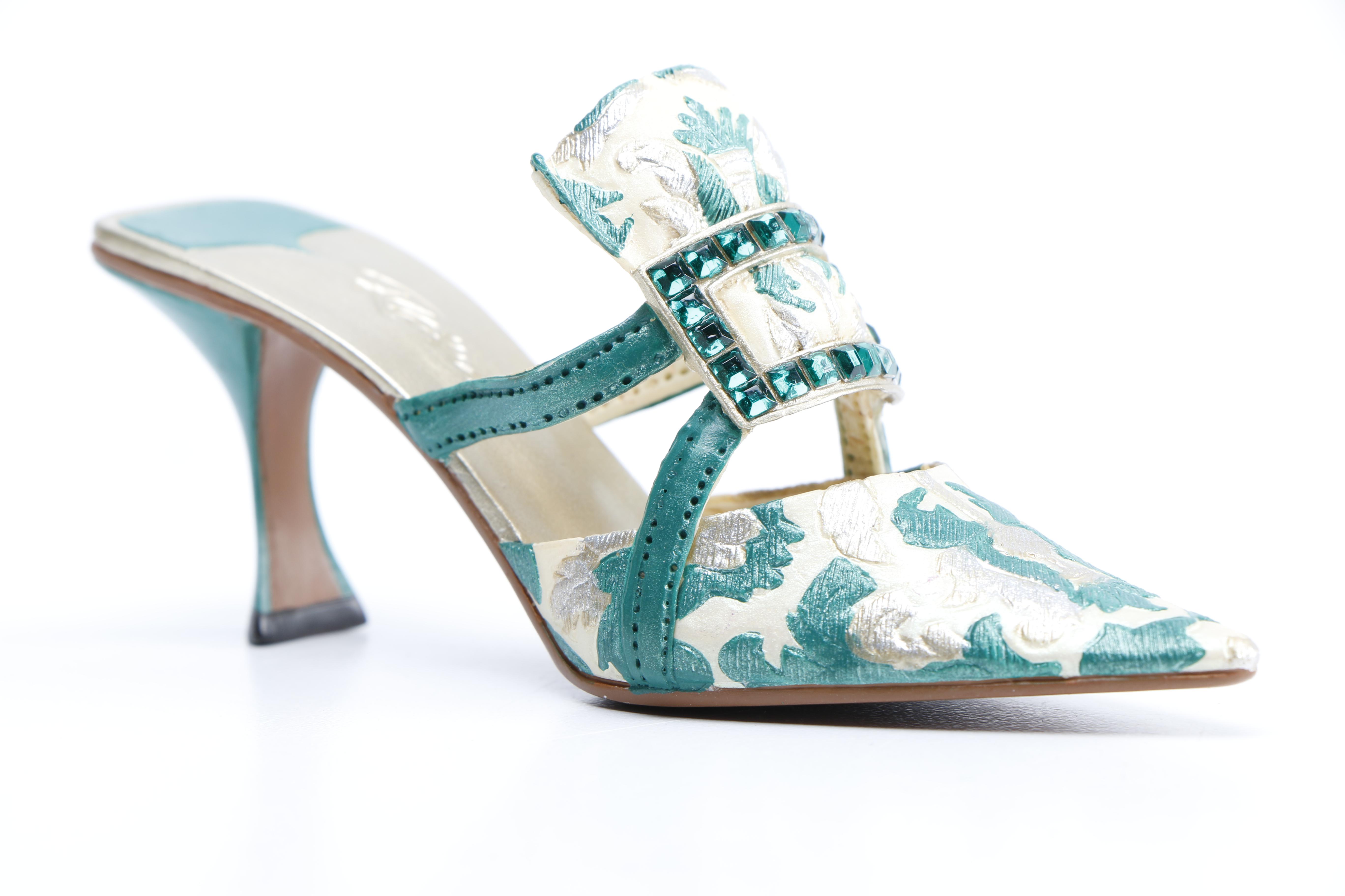 Miniature Heel Figurines Featuring Raine