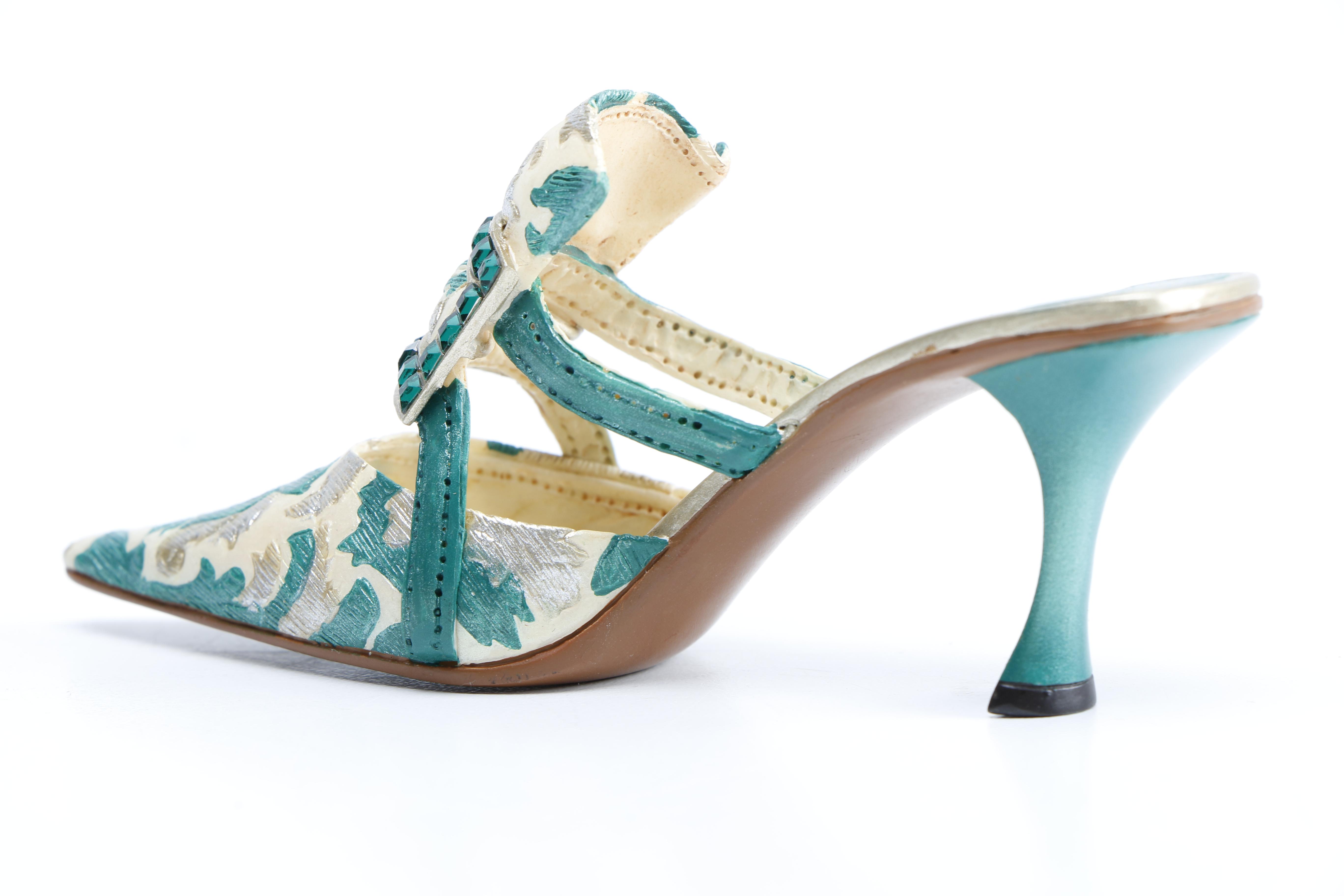 Miniature Heel Figurines Featuring Raine