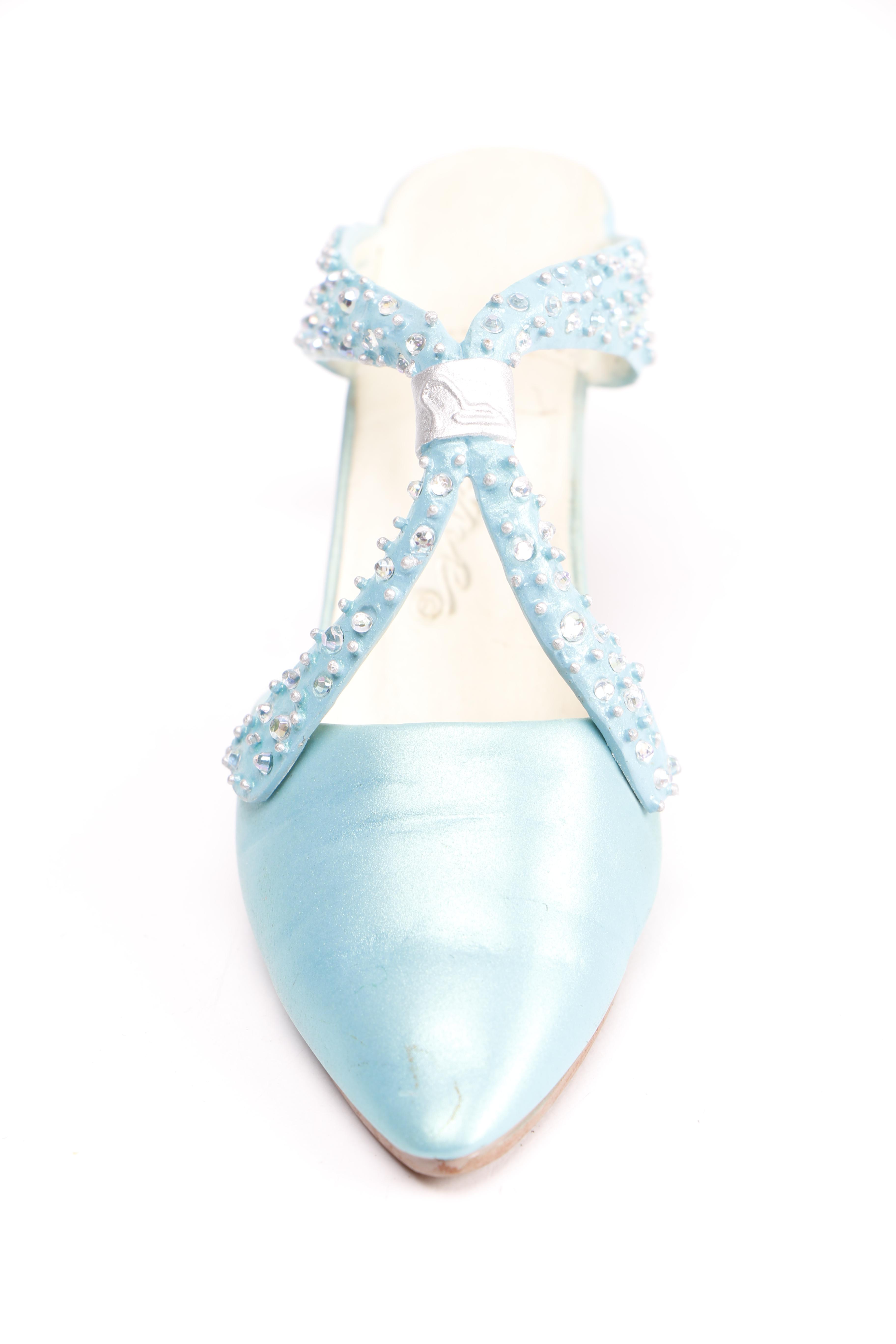 Miniature Heel Figurines Featuring Raine