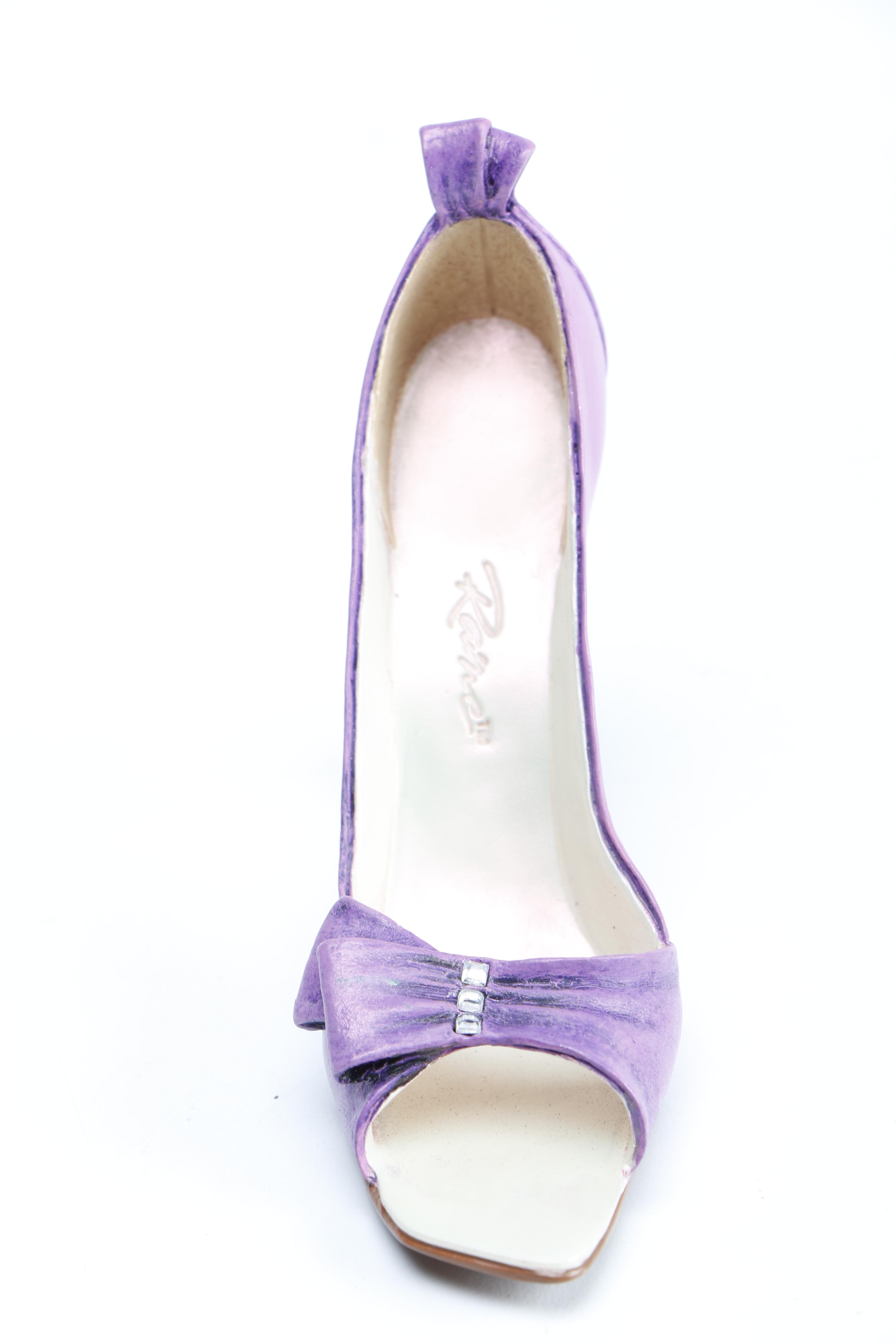 Miniature Heel Figurines Featuring Raine