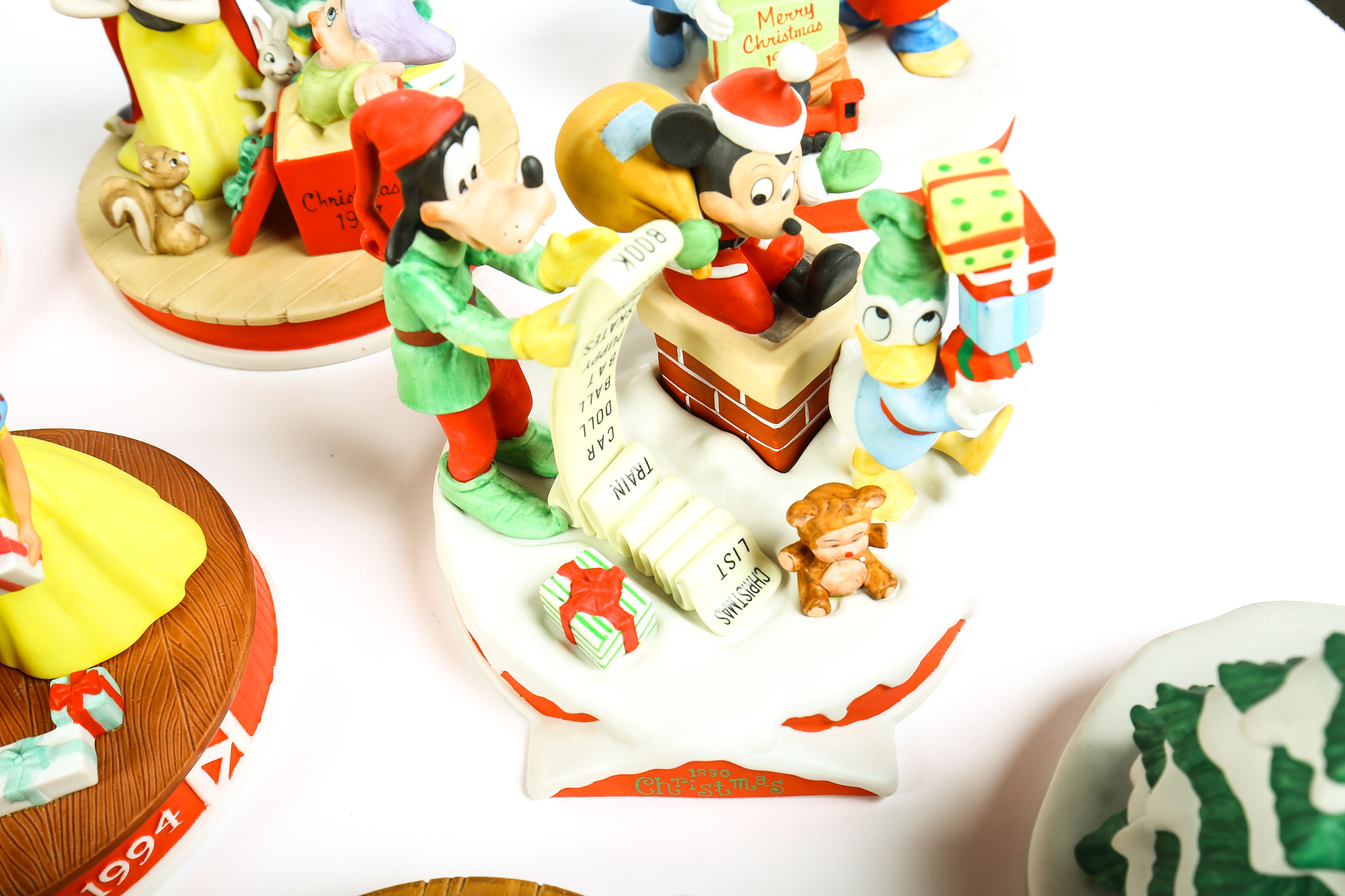 Disney's Limited Edition Figurines and Framed Artworks