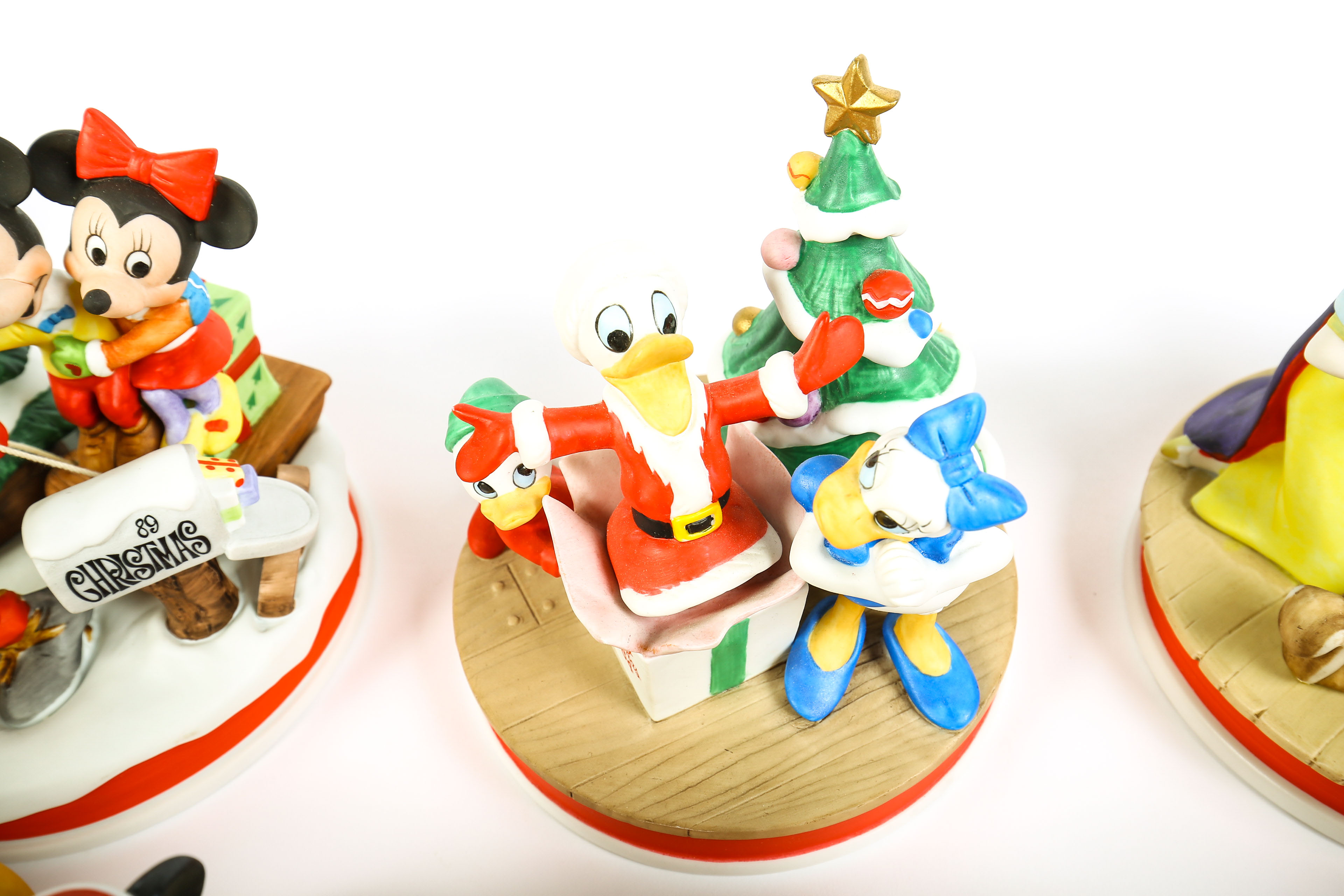 Disney's Limited Edition Figurines and Framed Artworks