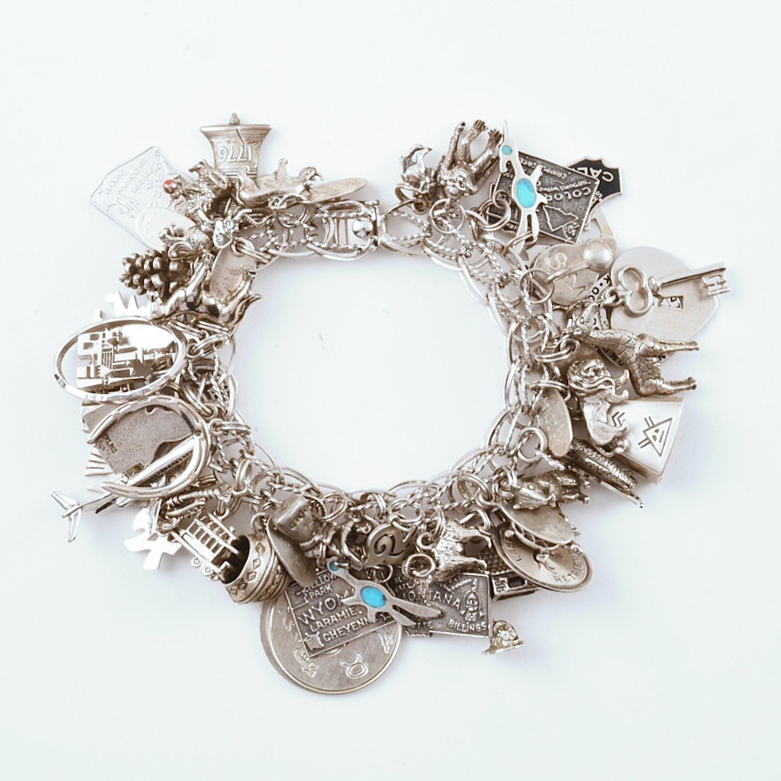 Sterling Silver Charm Bracelet with Forty-Nine (49) Charms