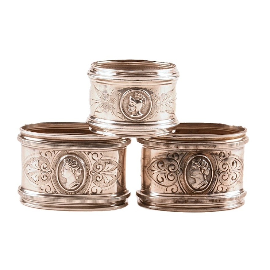 Two Sterling Silver and One Coin Silver Medallion Napkin Rings