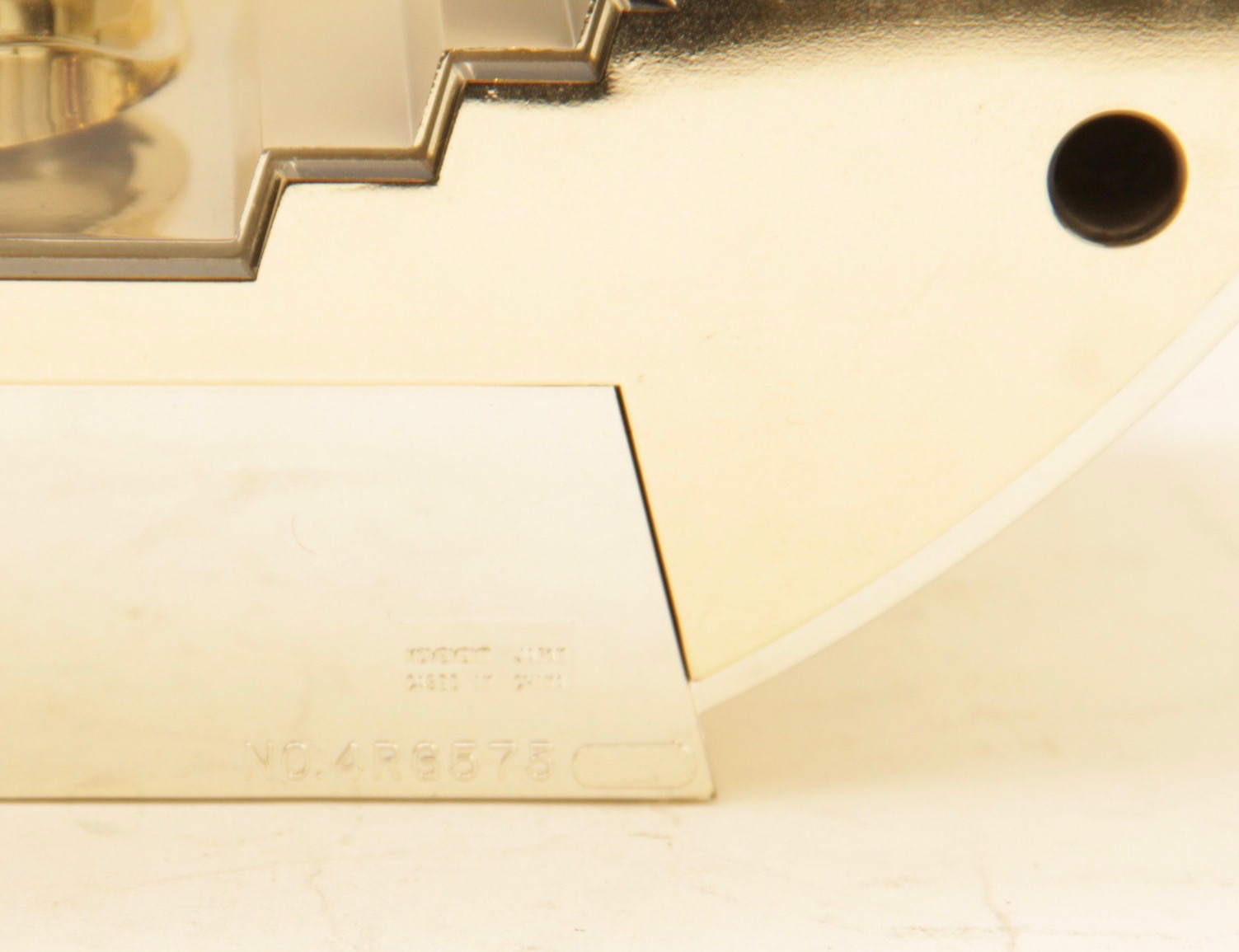 Circular Gold Toned Rhythm Quartz Clock