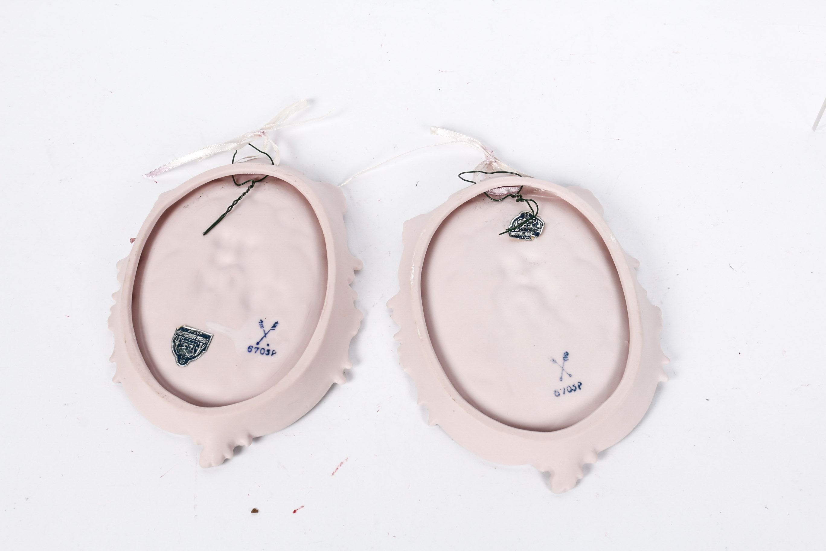 Pair of Pink Arnart Jasperware-Style Wall Plaques