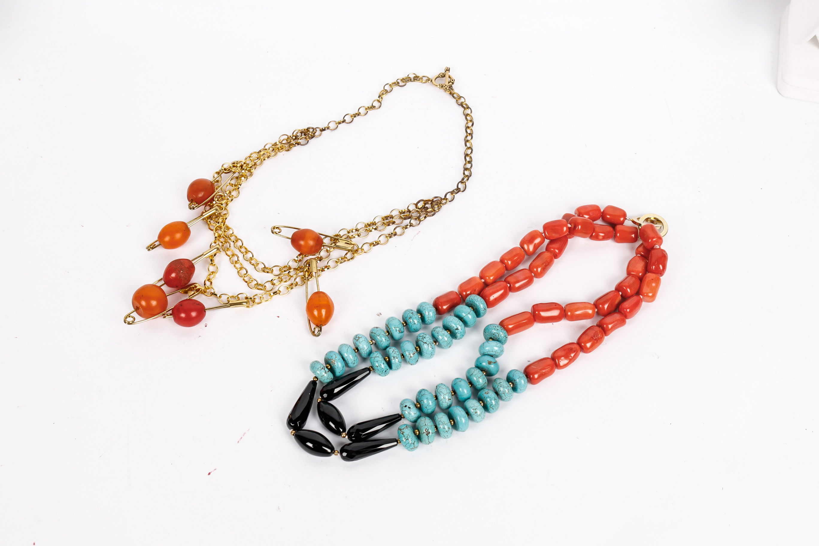 Pair of Coral and Howlite Necklaces