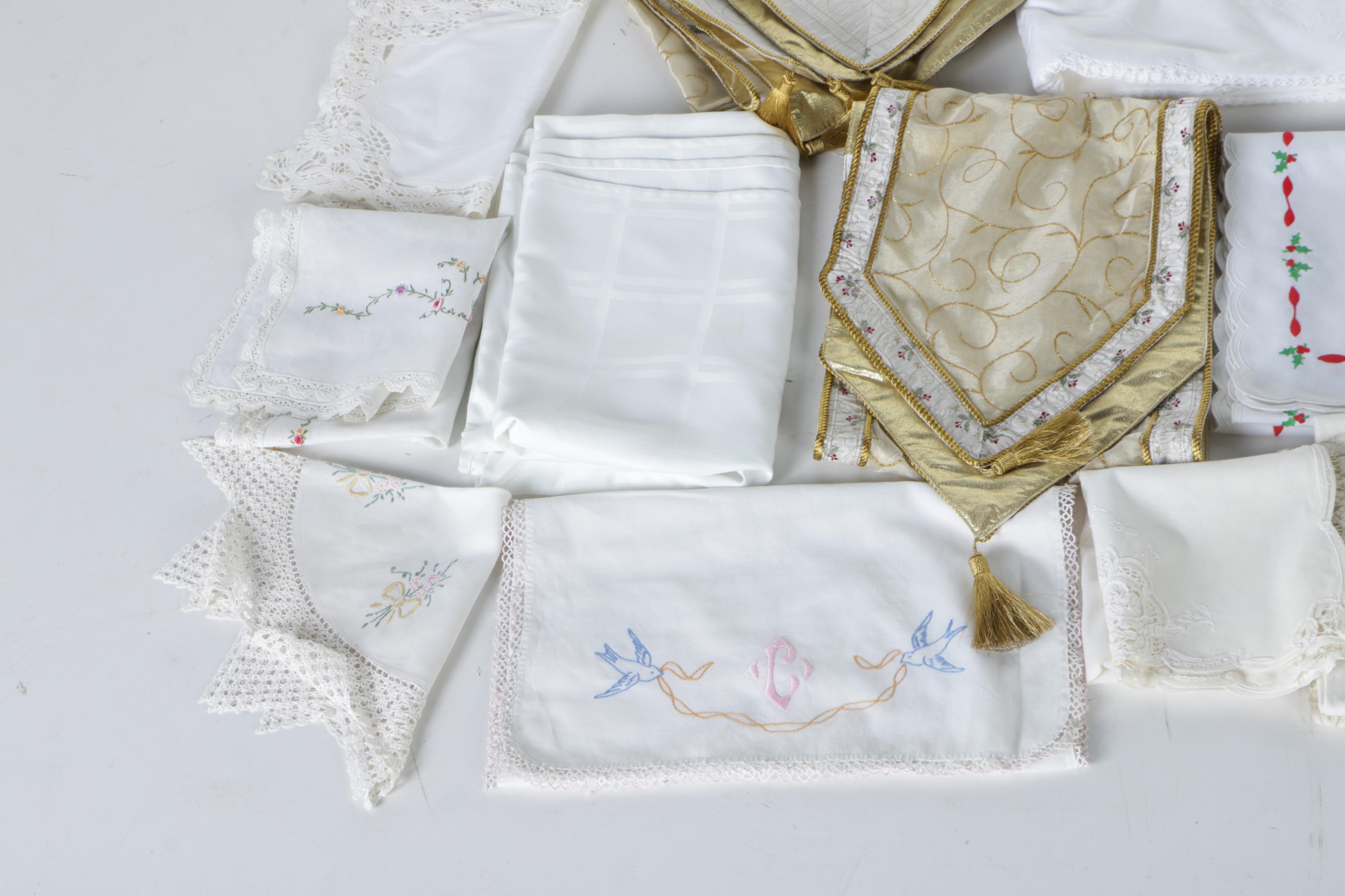 Assortment of Table Linens and a Blanket