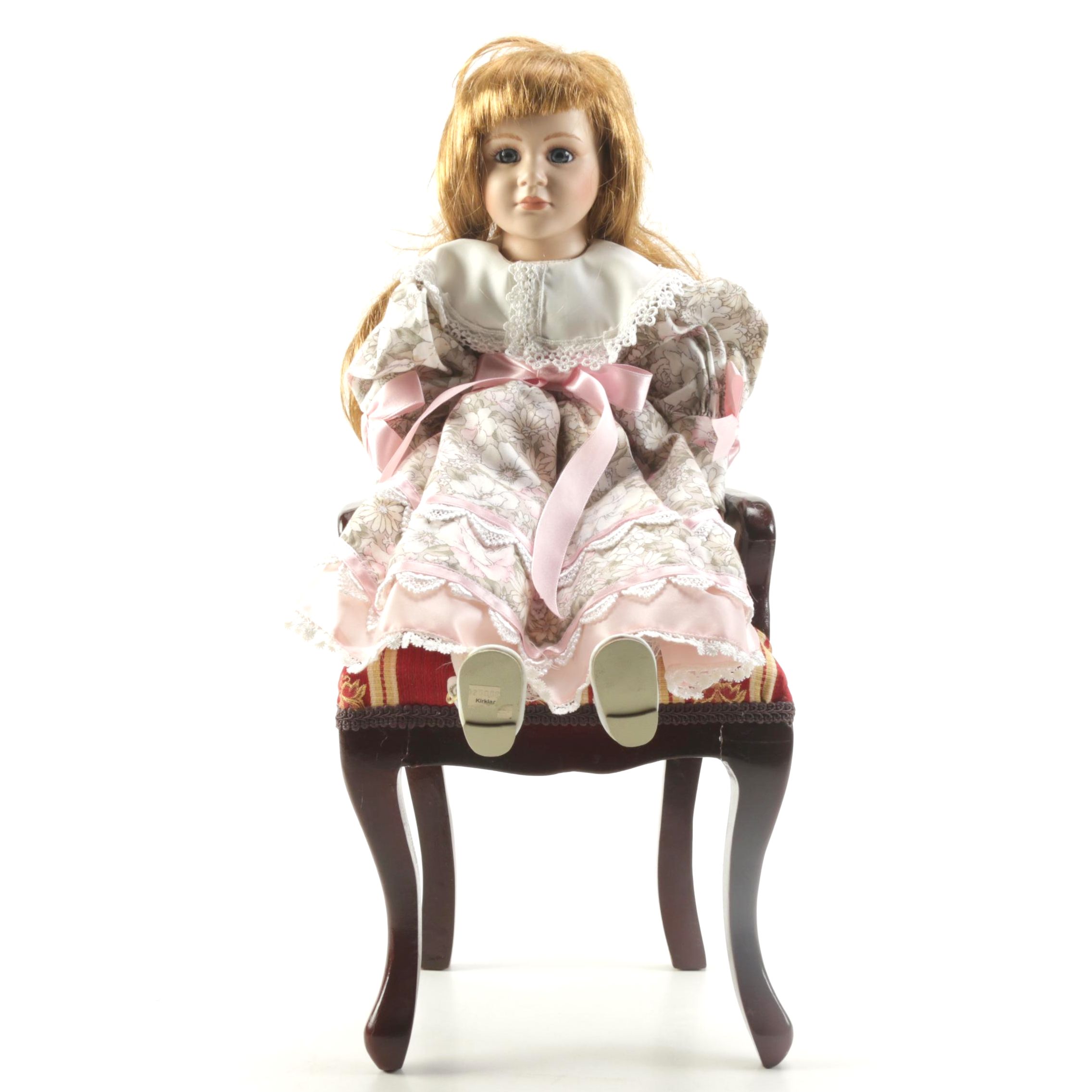 Porcelain Doll in Chair