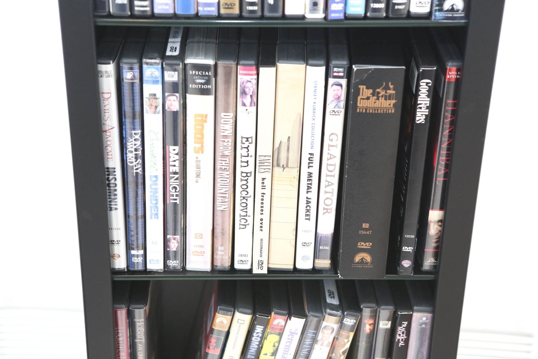 70 Feature Film DVDs and Storage Cabinet