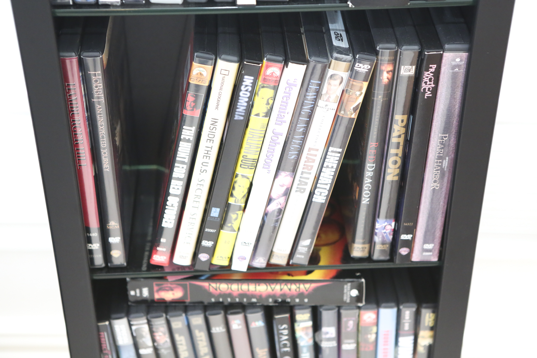 70 Feature Film DVDs and Storage Cabinet