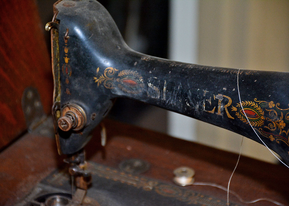 Antique Singer Sewing Machine with Treadle Table