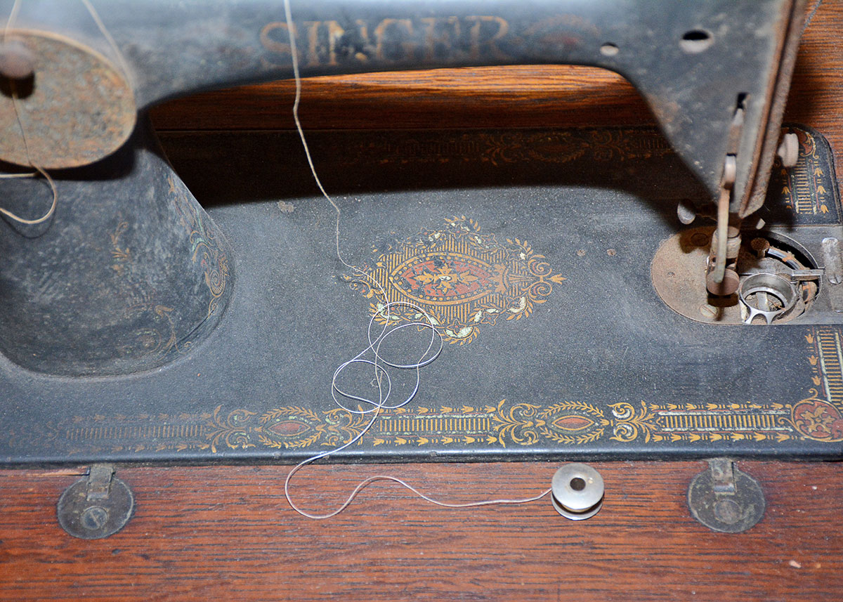 Antique Singer Sewing Machine with Treadle Table