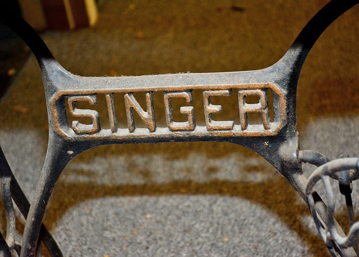 Antique Singer Sewing Machine with Treadle Table