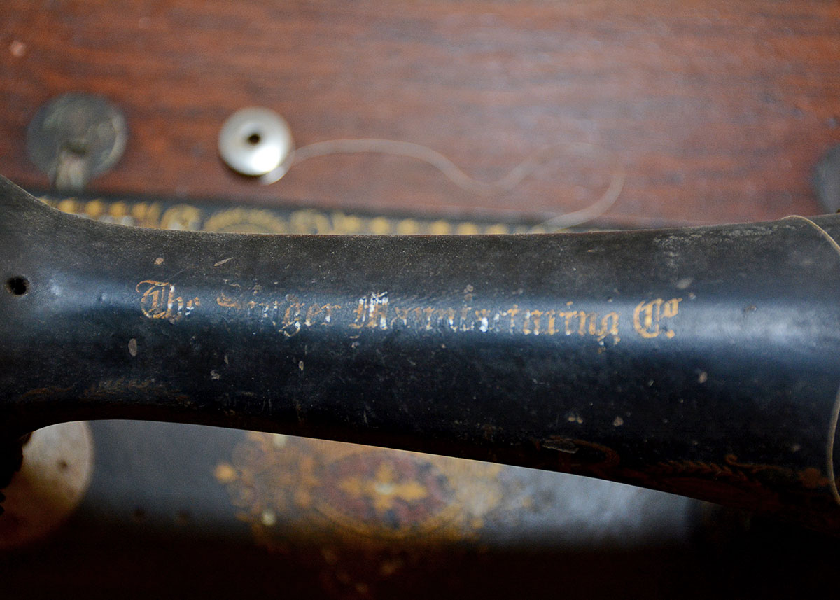 Antique Singer Sewing Machine with Treadle Table
