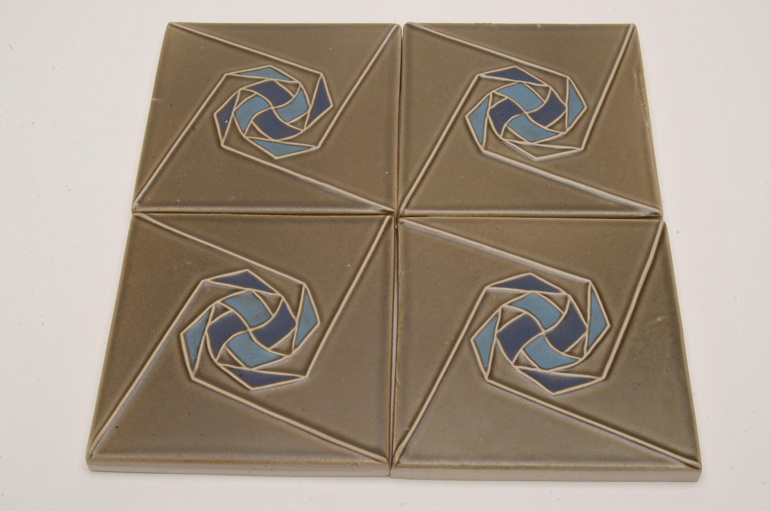 Group of Four "Melody" Patterned Rookwood Tiles