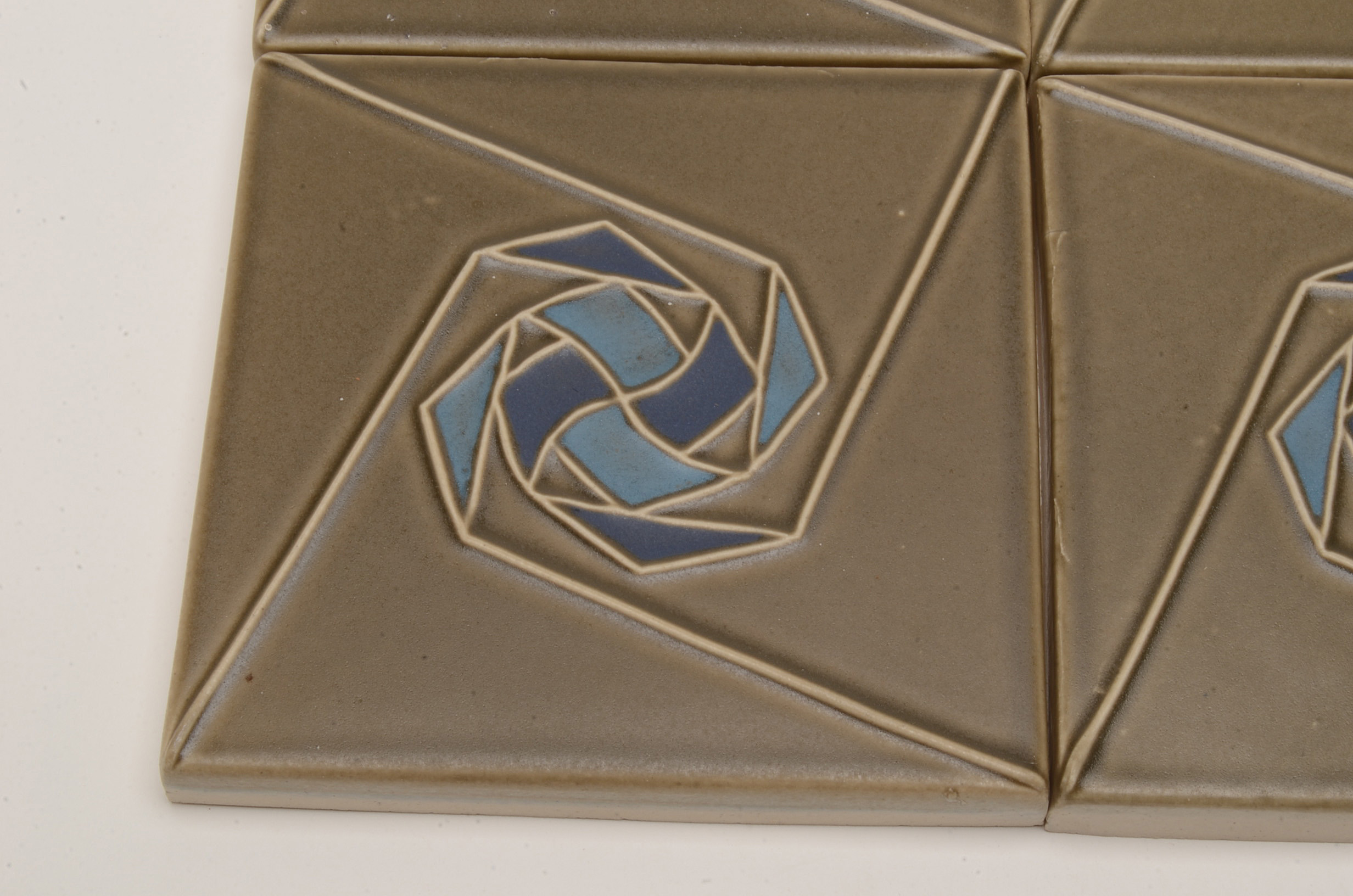 Group of Four "Melody" Patterned Rookwood Tiles