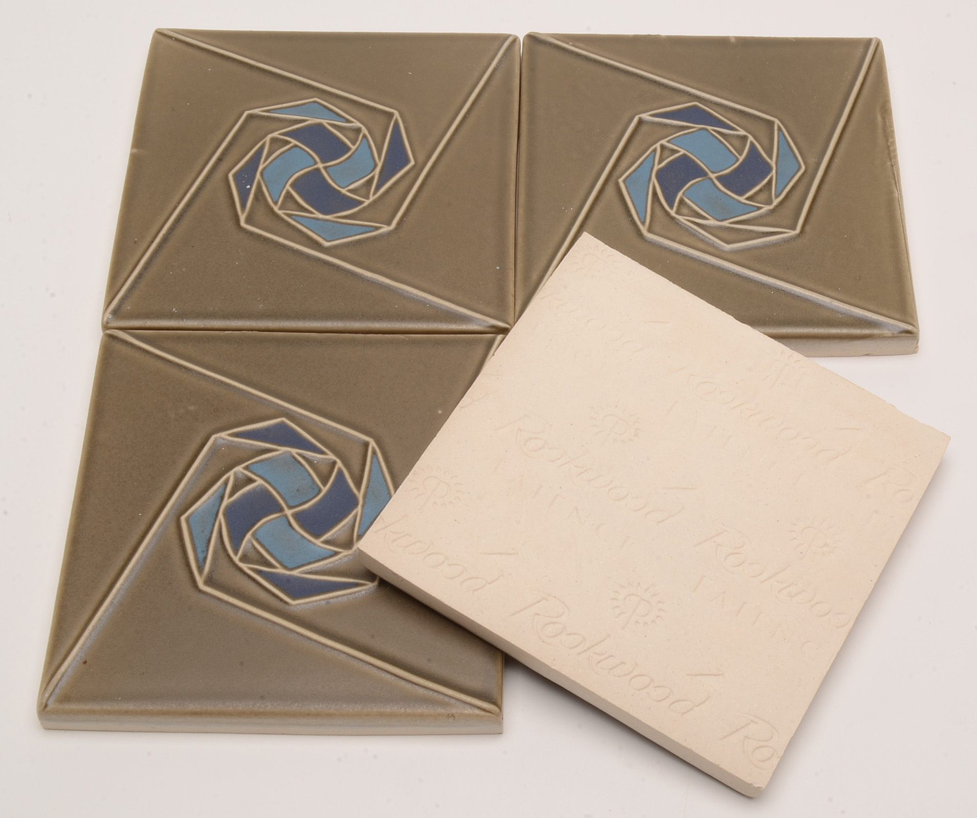 Group of Four "Melody" Patterned Rookwood Tiles