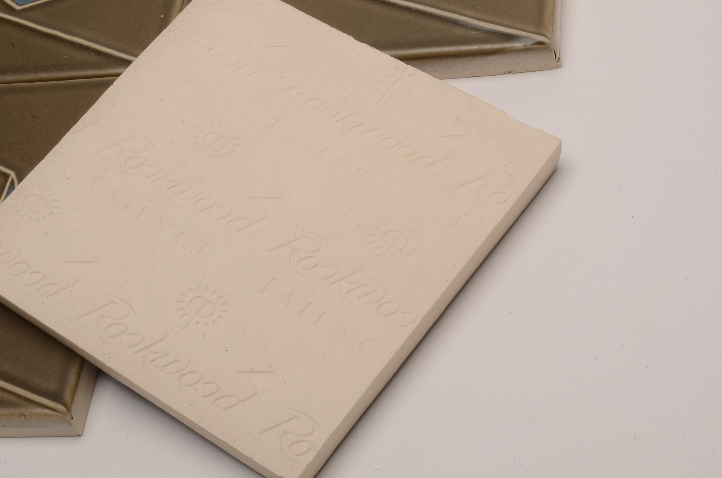 Group of Four "Melody" Patterned Rookwood Tiles