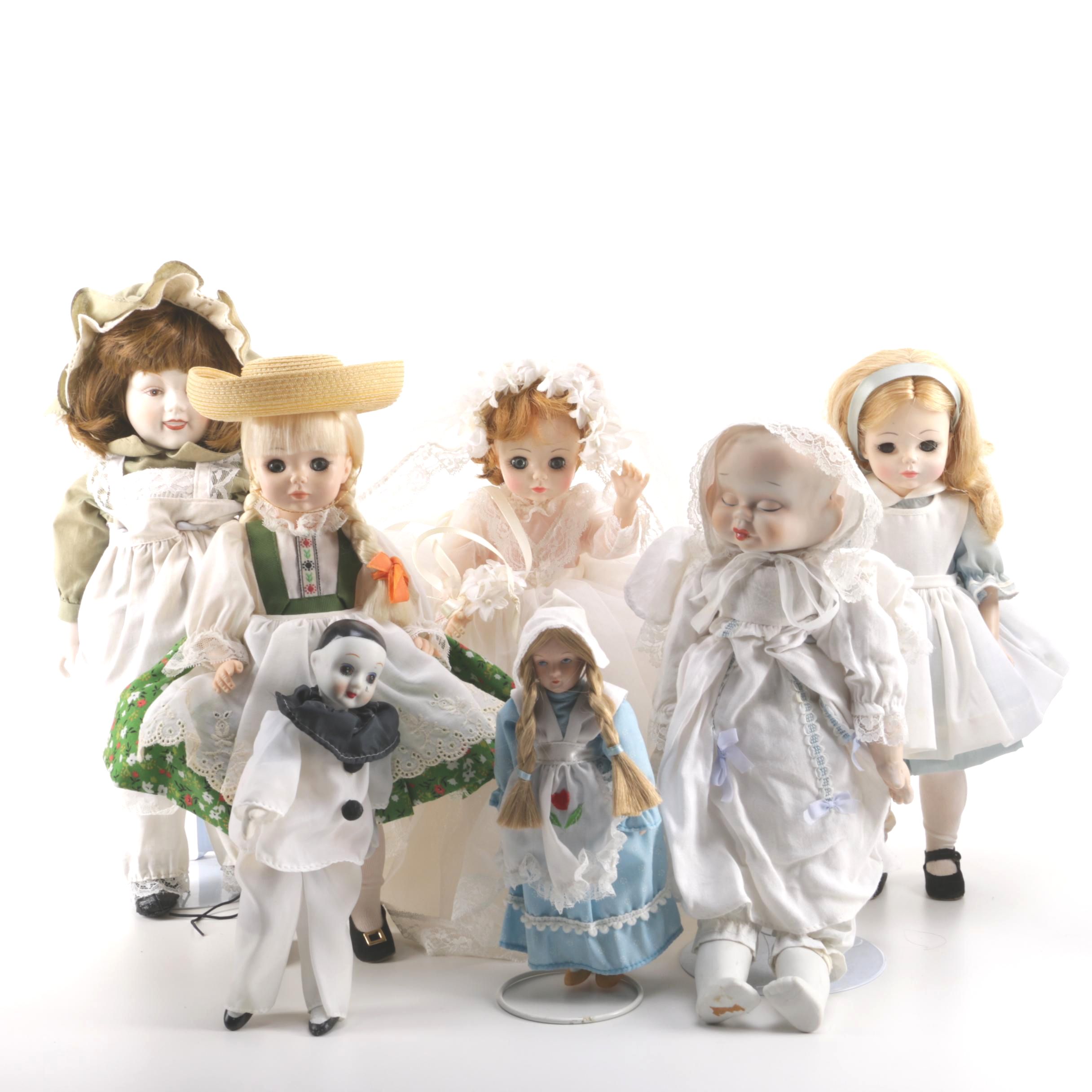 Doll Collection Including Madame Alexander, a Pierrot, and a Three-Faced Baby Doll