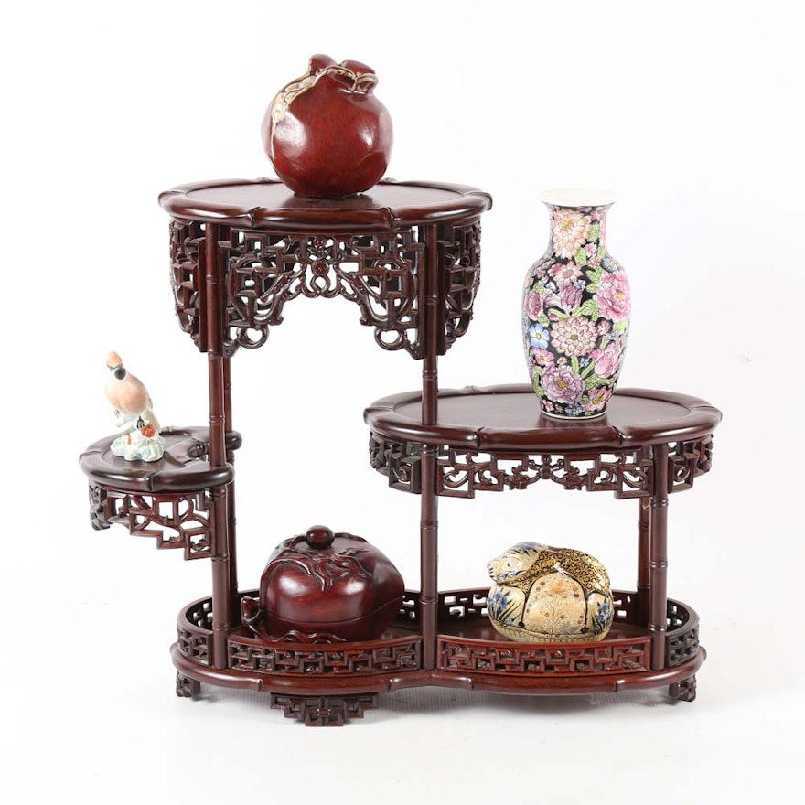 Carved Wooden Display Stand with Decorative Accents